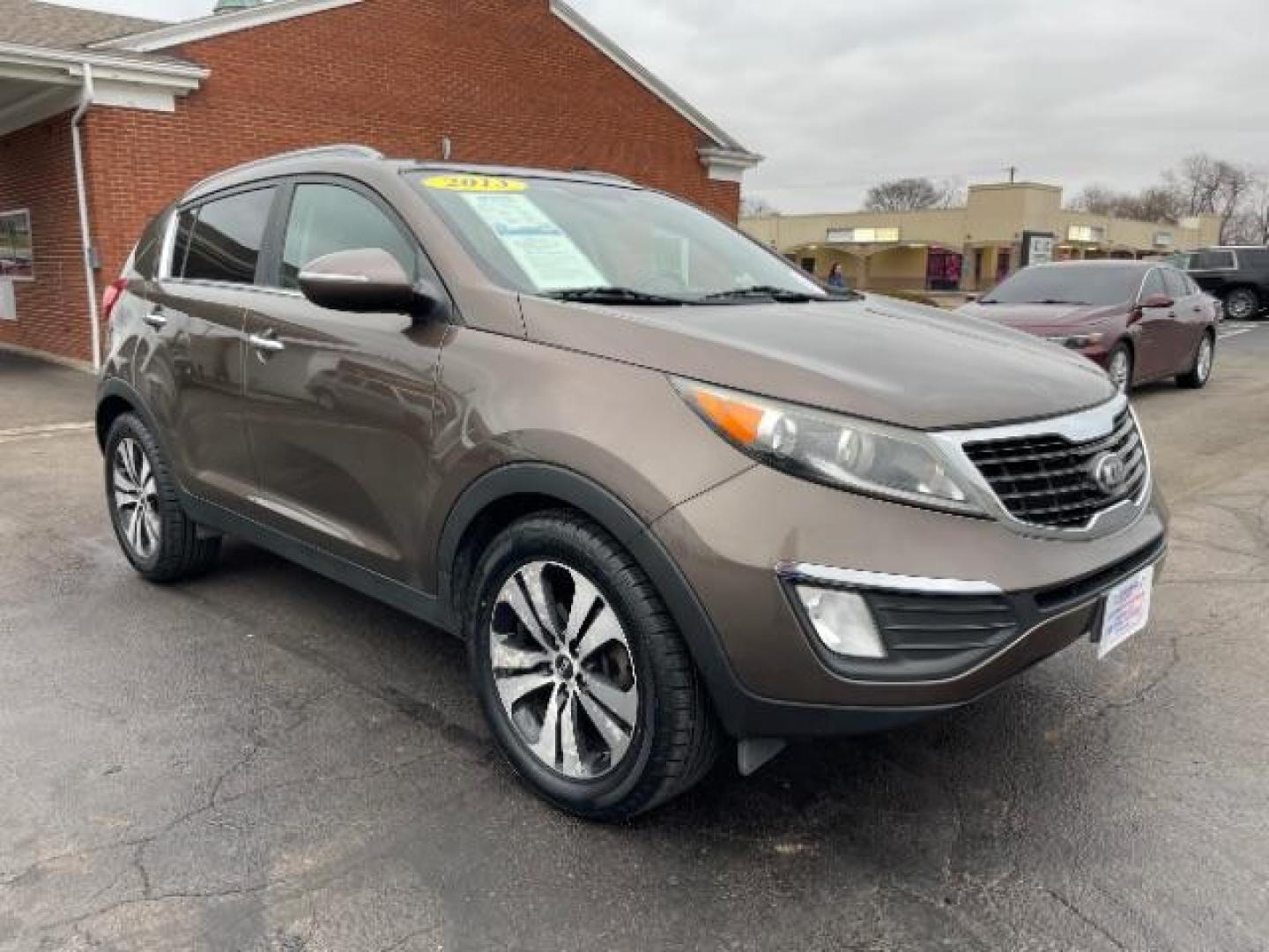 2013 Sand Track Kia Sportage EX FWD (KNDPC3A20D7) with an 2.4L V6 DOHC 24V engine, 6-Speed Automatic transmission, located at 1099 N County Rd 25A , Troy, OH, 45373, (937) 908-9800, 40.057079, -84.212883 - Photo#0