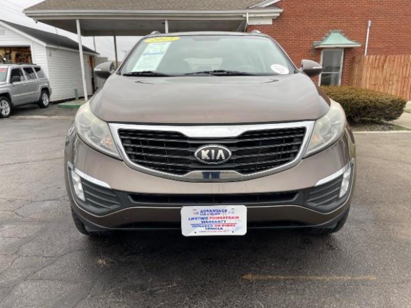 2013 Sand Track Kia Sportage EX FWD (KNDPC3A20D7) with an 2.4L V6 DOHC 24V engine, 6-Speed Automatic transmission, located at 1099 N County Rd 25A , Troy, OH, 45373, (937) 908-9800, 40.057079, -84.212883 - Photo#4