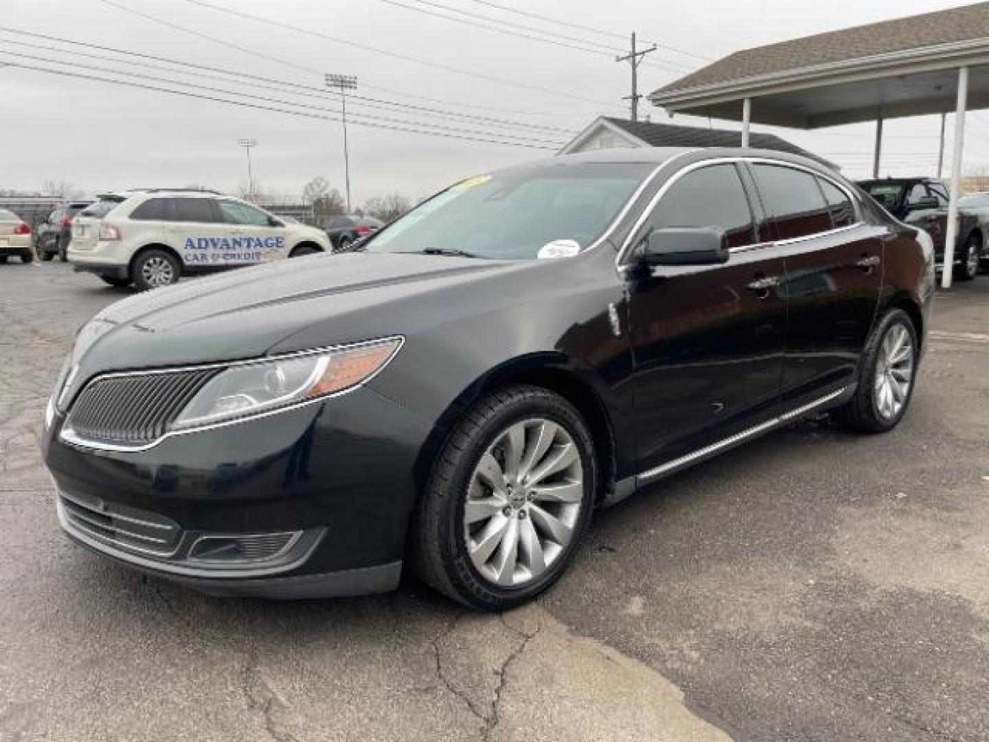 2013 Tuxedo Black Lincoln MKS FWD (1LNHL9DK0DG) with an 3.5L V6 DOHC 24V engine, 6-Speed Automatic transmission, located at 1230 East Main St, Xenia, OH, 45385, (937) 908-9800, 39.688026, -83.910172 - Photo#1