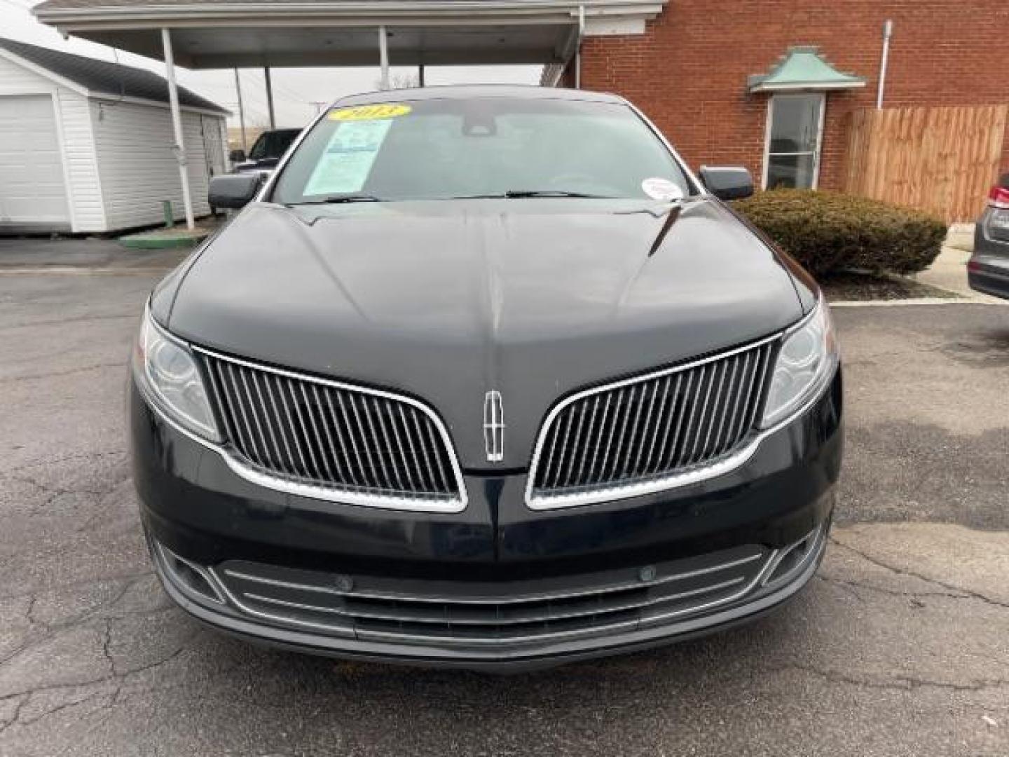 2013 Tuxedo Black Lincoln MKS FWD (1LNHL9DK0DG) with an 3.5L V6 DOHC 24V engine, 6-Speed Automatic transmission, located at 1230 East Main St, Xenia, OH, 45385, (937) 908-9800, 39.688026, -83.910172 - Photo#5