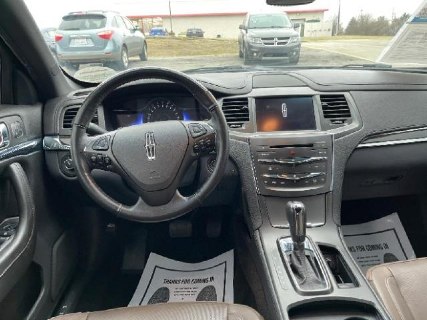 2013 Tuxedo Black Lincoln MKS FWD (1LNHL9DK0DG) with an 3.5L V6 DOHC 24V engine, 6-Speed Automatic transmission, located at 1230 East Main St, Xenia, OH, 45385, (937) 908-9800, 39.688026, -83.910172 - Photo#7