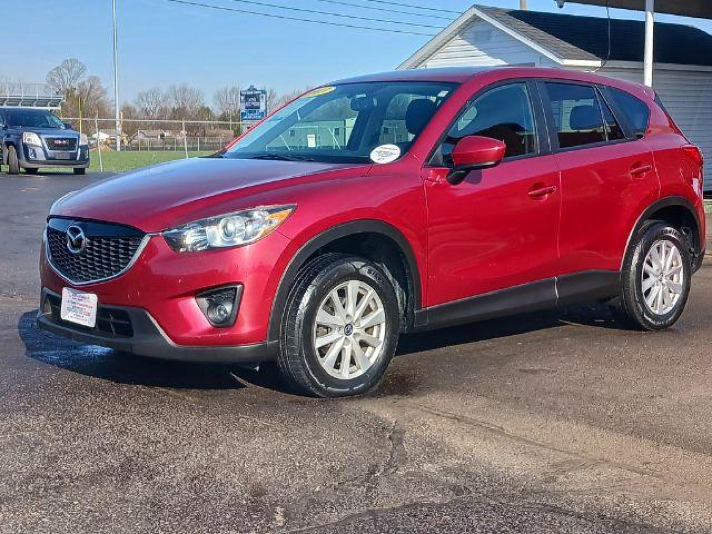 2013 Red Mazda CX-5 Touring AWD (JM3KE4CE4D0) with an 2.0L L4 DOHC 16V engine, 6-Speed Automatic transmission, located at 401 Woodman Dr, Riverside, OH, 45431, (937) 908-9800, 39.760899, -84.123421 - Photo#2