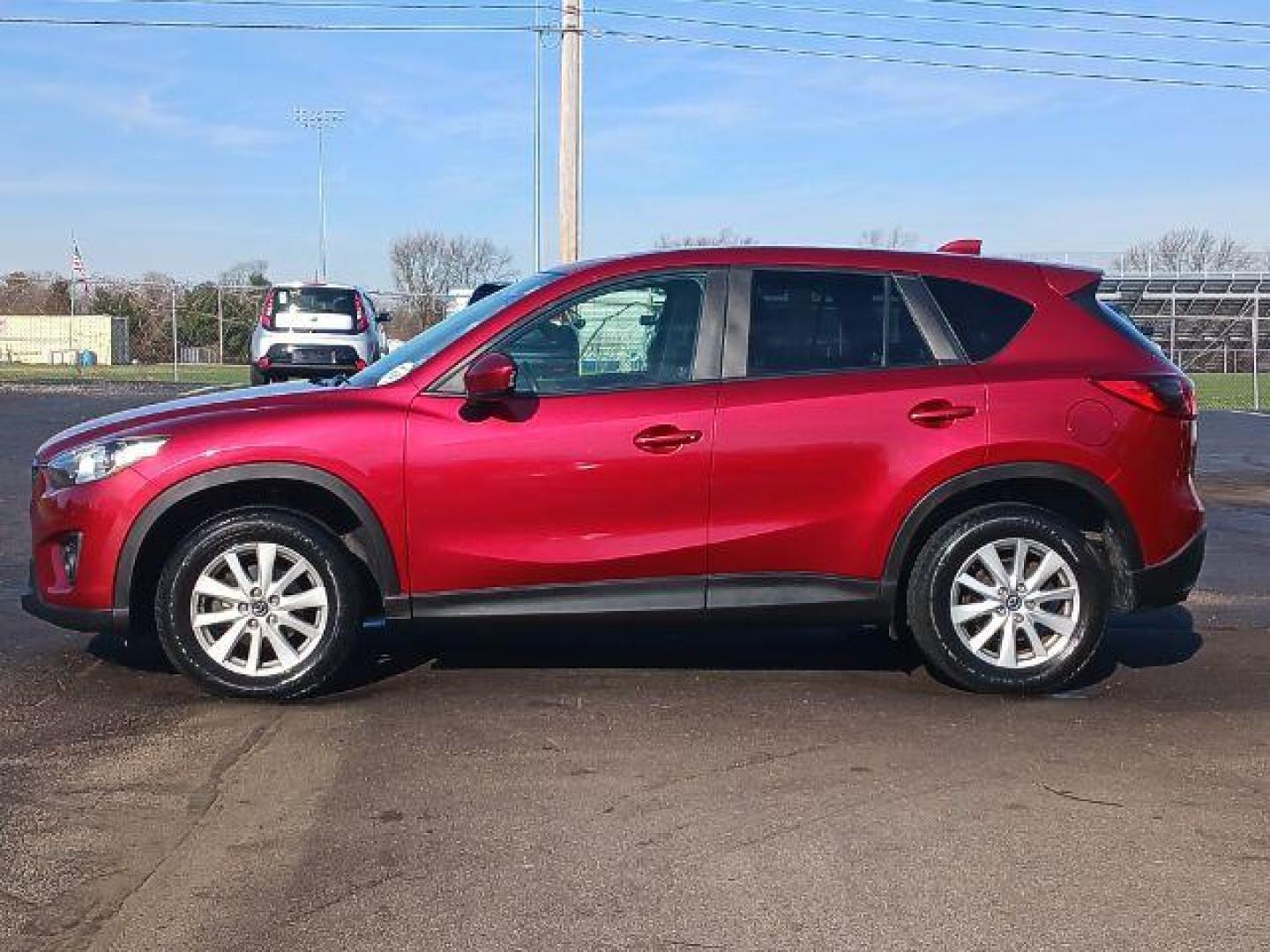 2013 Red Mazda CX-5 Touring AWD (JM3KE4CE4D0) with an 2.0L L4 DOHC 16V engine, 6-Speed Automatic transmission, located at 401 Woodman Dr, Riverside, OH, 45431, (937) 908-9800, 39.760899, -84.123421 - Photo#3