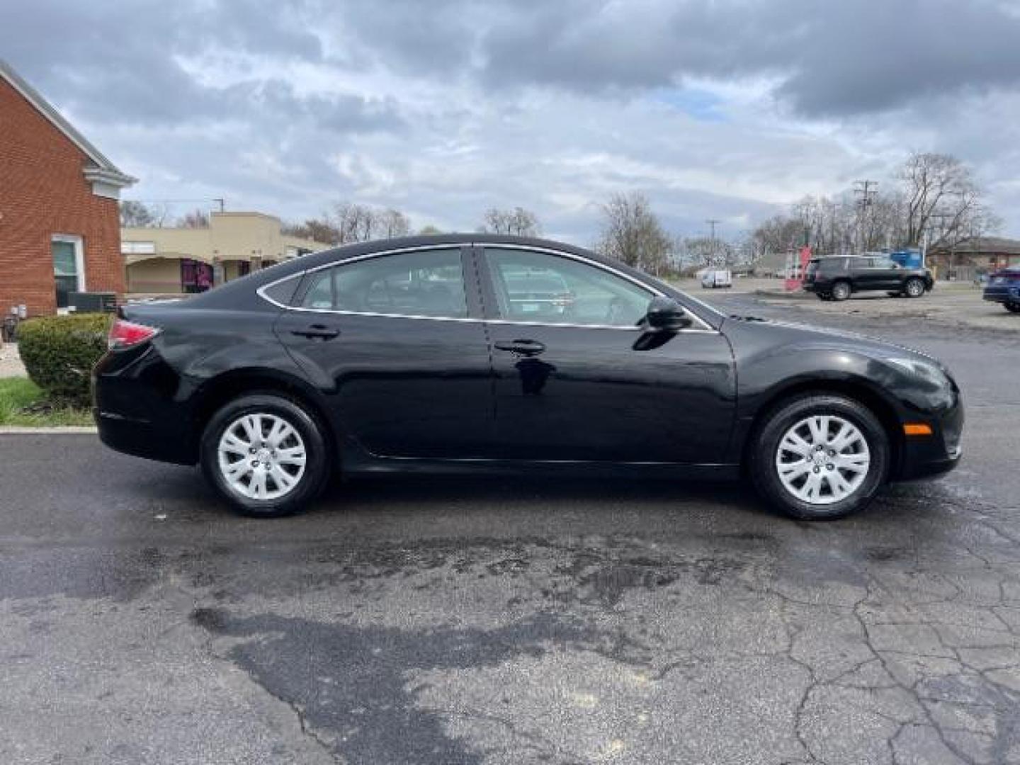 2013 Ebony Black Mazda Mazda6 i Sport (1YVHZ8BH8D5) with an 2.5L L4 DOHC 16V engine, 6-Speed Automatic transmission, located at 4508 South Dixie Dr, Moraine, OH, 45439, (937) 908-9800, 39.689976, -84.218452 - Photo#3