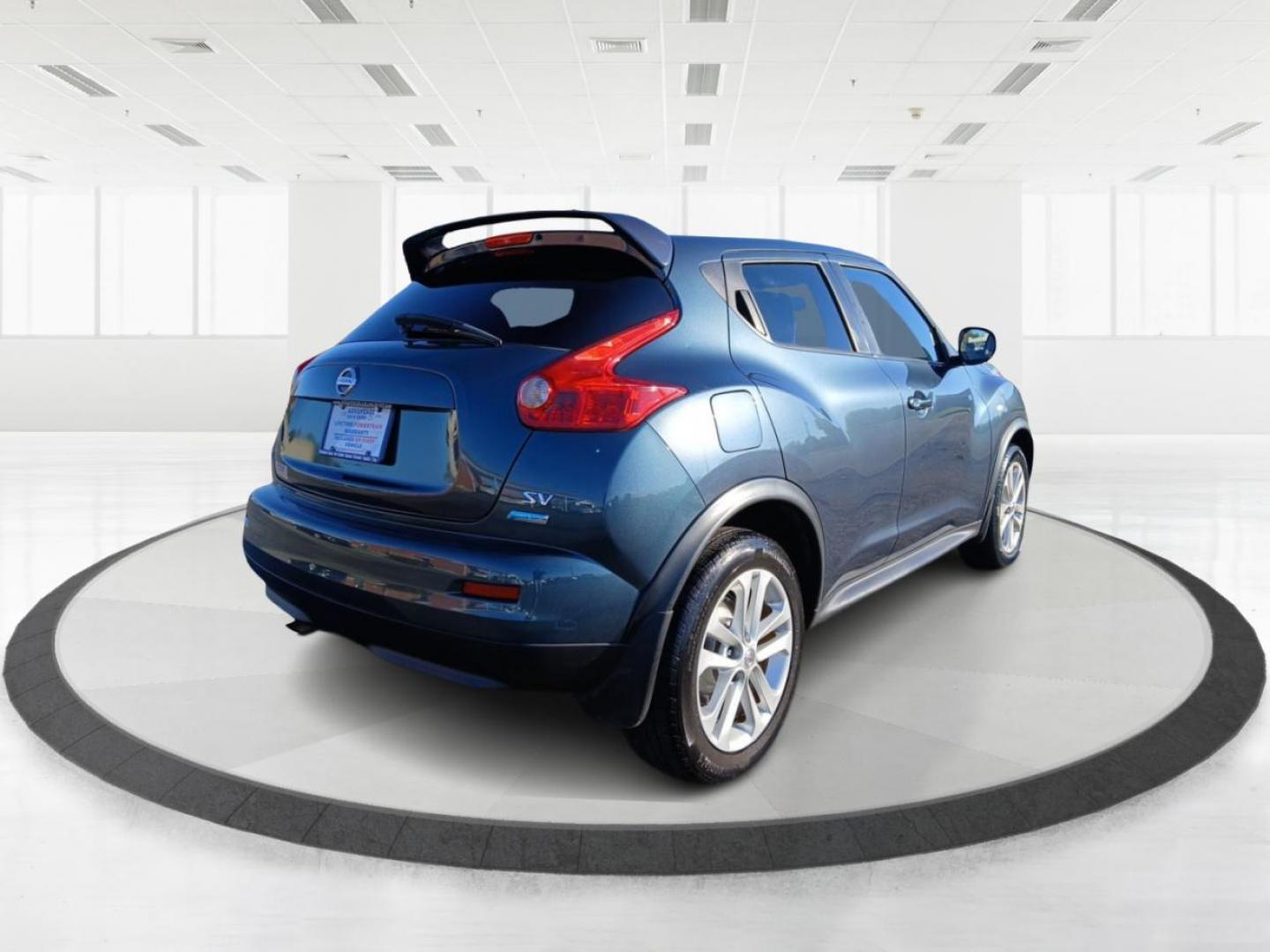 2013 Graphite Blue Nissan Juke S FWD (JN8AF5MR4DT) with an 1.6L L4 DOHC 16V engine, Continuously Variable Transmission transmission, located at 8750 N County Rd 25A, Piqua, OH, 45356, (937) 908-9800, 40.164391, -84.232513 - Photo#2