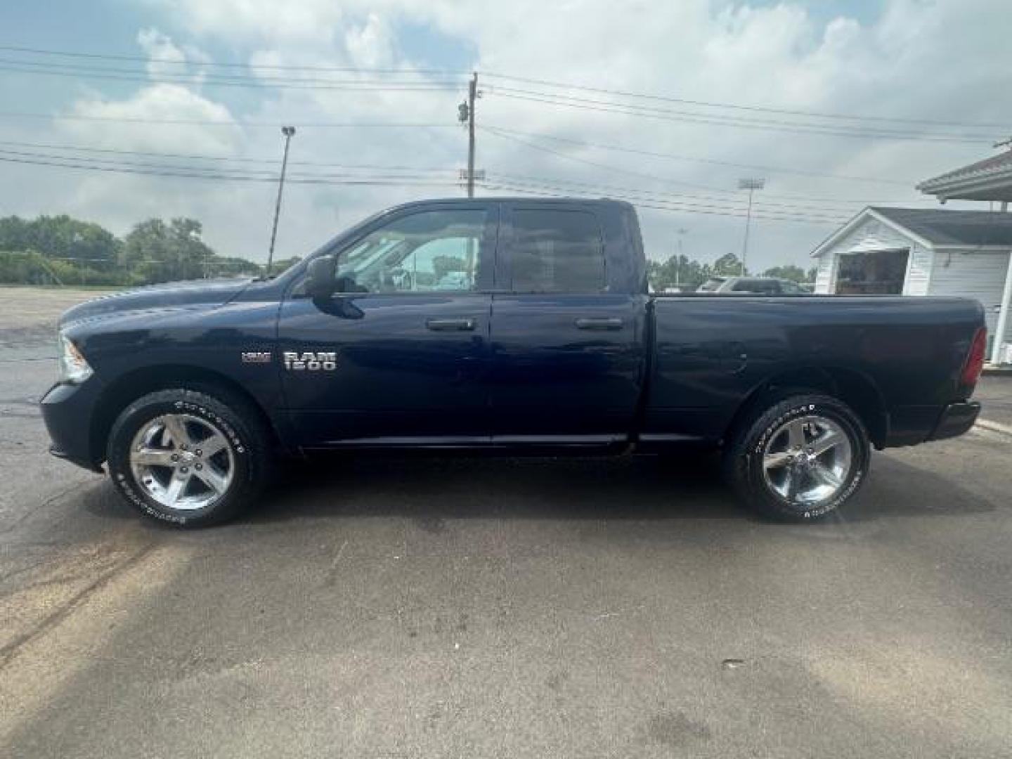 2013 True Blue Pearl RAM 1500 Tradesman Quad Cab 4WD (1C6RR7FT7DS) with an 5.7L V8 OHV 16V engine, 6-Speed Automatic transmission, located at 880 E. National Road, Vandalia, OH, 45377, (937) 908-9800, 39.891918, -84.183594 - Photo#3