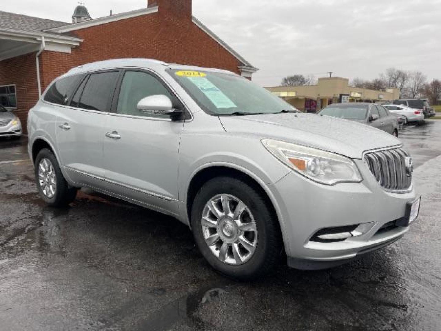 2014 Quicksilver Metallic Buick Enclave Leather FWD (5GAKRBKD4EJ) with an 3.6L V6 DOHC 24V engine, 6-Speed Automatic Overdrive transmission, located at 1951 S Dayton Lakeview Rd., New Carlisle, OH, 45344, (937) 908-9800, 39.890999, -84.050255 - Photo#0