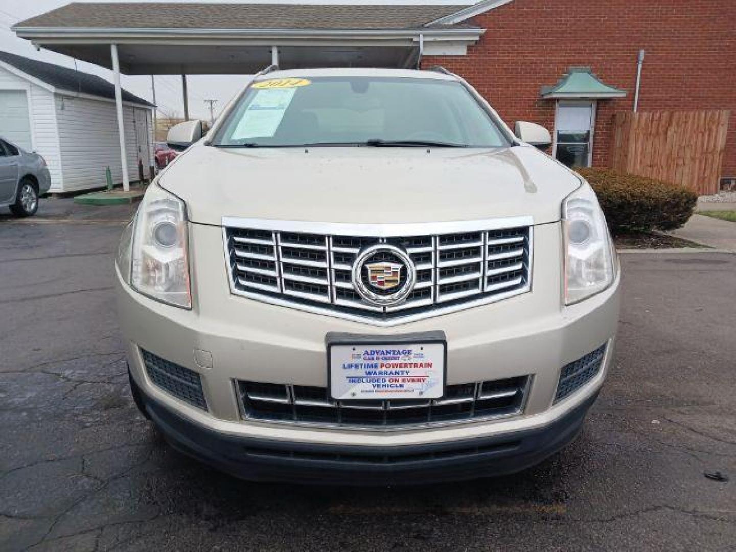 2014 Terra Mocha Metallic Cadillac SRX Standard FWD (3GYFNAE3XES) with an 3.6L V6 DOHC 24V FFV engine, 6-Speed Automatic transmission, located at 401 Woodman Dr, Riverside, OH, 45431, (937) 908-9800, 39.760899, -84.123421 - Photo#1