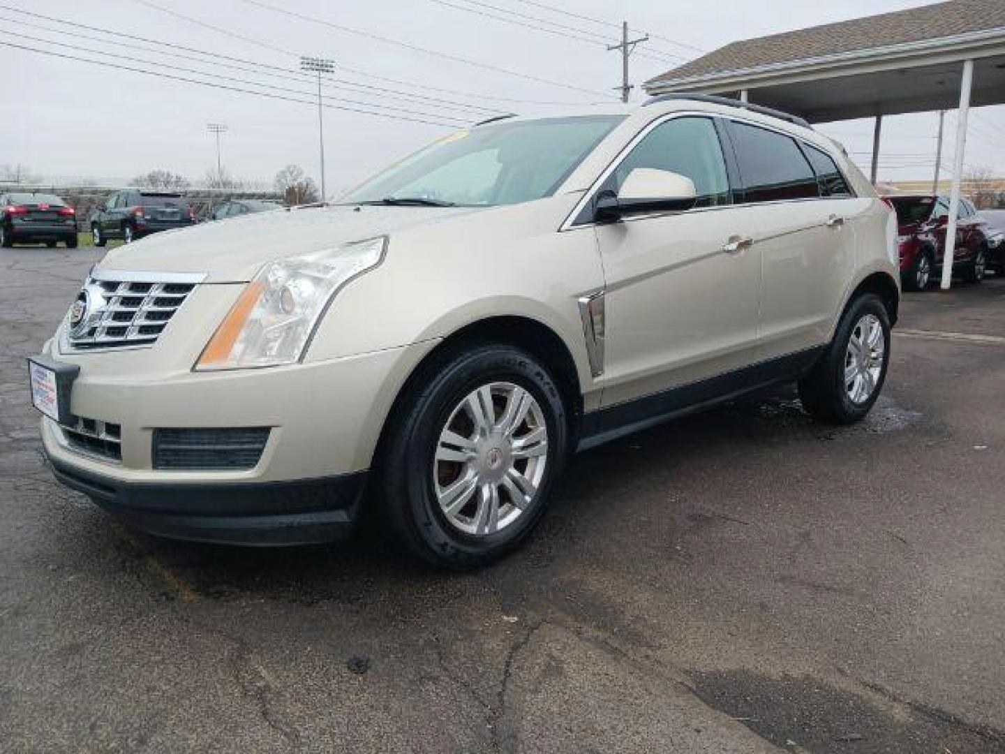 2014 Terra Mocha Metallic Cadillac SRX Standard FWD (3GYFNAE3XES) with an 3.6L V6 DOHC 24V FFV engine, 6-Speed Automatic transmission, located at 401 Woodman Dr, Riverside, OH, 45431, (937) 908-9800, 39.760899, -84.123421 - Photo#2