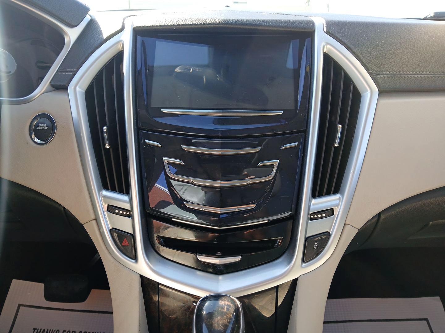 2014 Cadillac SRX Luxury Collection AWD (3GYFNEE30ES) with an 3.6L V6 DOHC 24V FFV engine, 6-Speed Automatic transmission, located at 401 Woodman Dr, Riverside, OH, 45431, (937) 908-9800, 39.760899, -84.123421 - 2014 Cadillac SRX Luxury Collection AWD - Photo#12