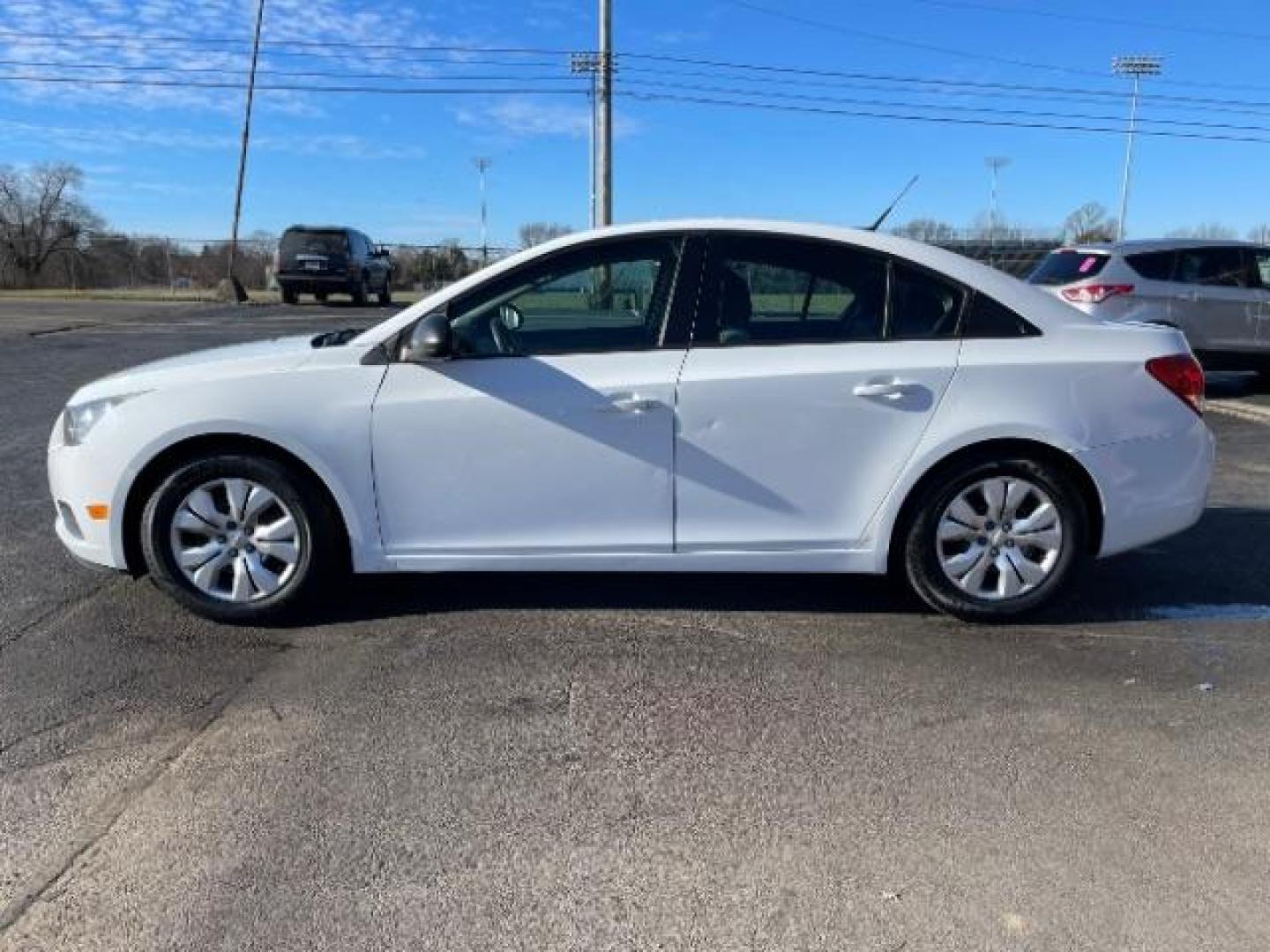 2014 Summit White Chevrolet Cruze LS Auto (1G1PA5SG7E7) with an 1.8L L4 DOHC 16V engine, 6-Speed Automatic transmission, located at 1099 N County Rd 25A , Troy, OH, 45373, (937) 908-9800, 40.057079, -84.212883 - Photo#2