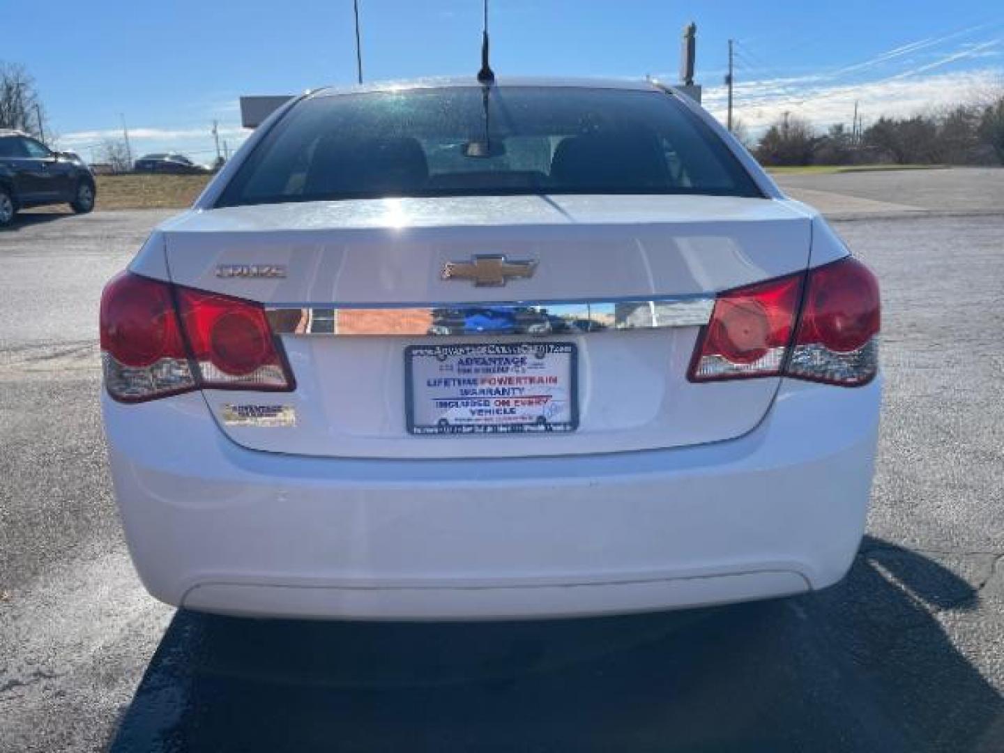 2014 Summit White Chevrolet Cruze LS Auto (1G1PA5SG7E7) with an 1.8L L4 DOHC 16V engine, 6-Speed Automatic transmission, located at 1099 N County Rd 25A , Troy, OH, 45373, (937) 908-9800, 40.057079, -84.212883 - Photo#5