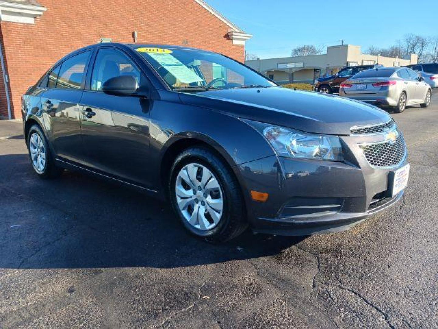 2014 Tungsten Metallic Chevrolet Cruze LS Auto (1G1PA5SH9E7) with an 1.8L L4 DOHC 16V FFV engine, 6-Speed Automatic transmission, located at 4508 South Dixie Dr, Moraine, OH, 45439, (937) 908-9800, 39.689976, -84.218452 - Photo#0