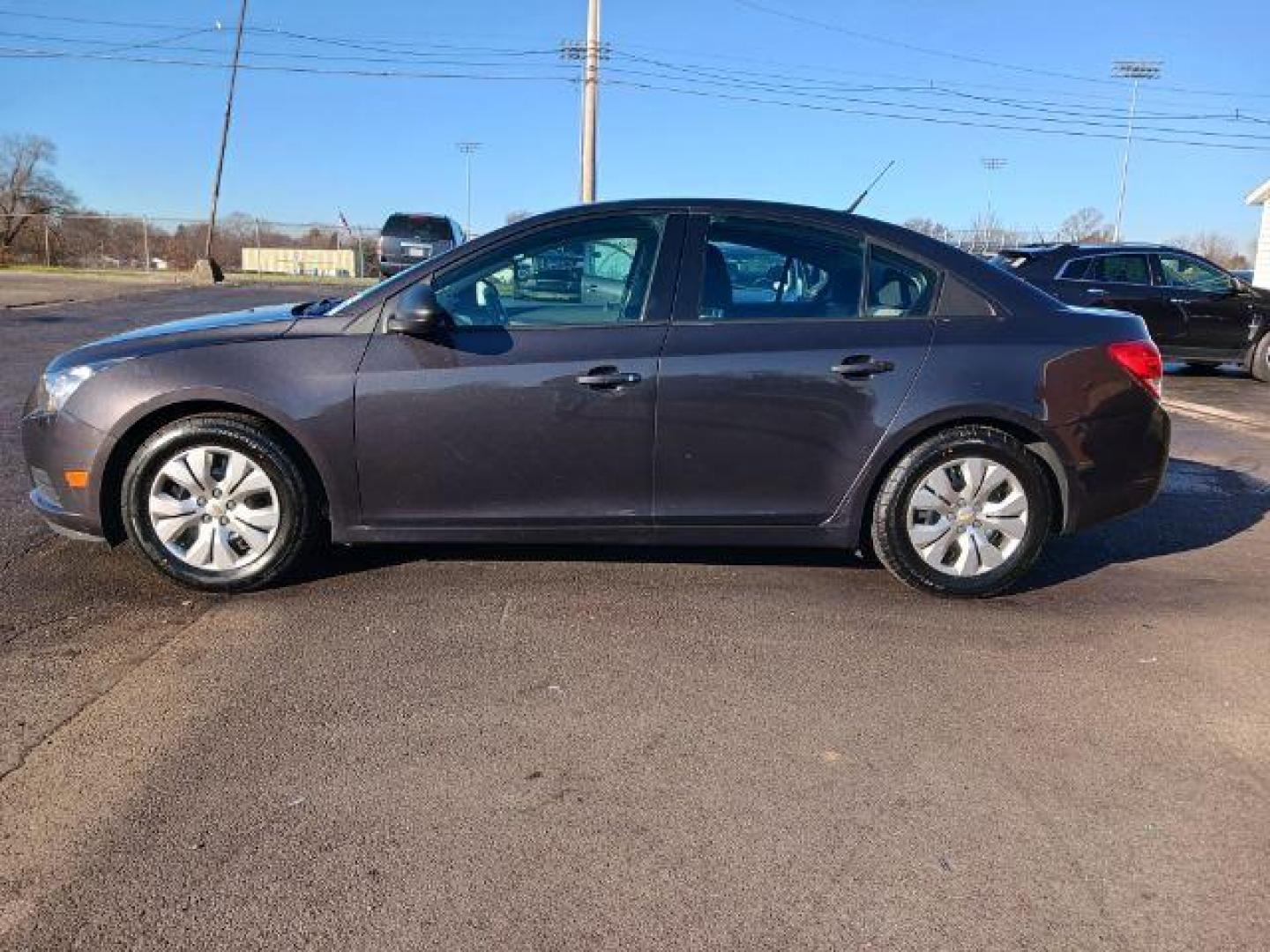 2014 Tungsten Metallic Chevrolet Cruze LS Auto (1G1PA5SH9E7) with an 1.8L L4 DOHC 16V FFV engine, 6-Speed Automatic transmission, located at 4508 South Dixie Dr, Moraine, OH, 45439, (937) 908-9800, 39.689976, -84.218452 - Photo#3