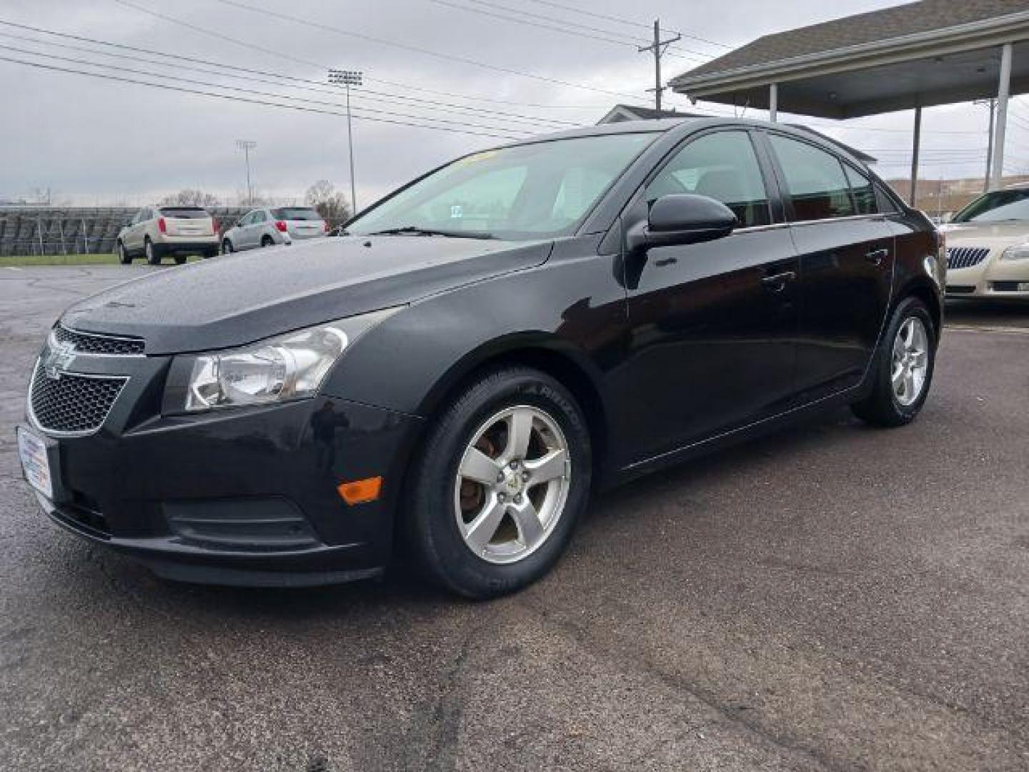 2014 Black Granite Metallic Chevrolet Cruze 1LT Auto (1G1PC5SB4E7) with an 1.4L L4 DOHC 16V TURBO engine, 6-Speed Automatic transmission, located at 4508 South Dixie Dr, Moraine, OH, 45439, (937) 908-9800, 39.689976, -84.218452 - Photo#2