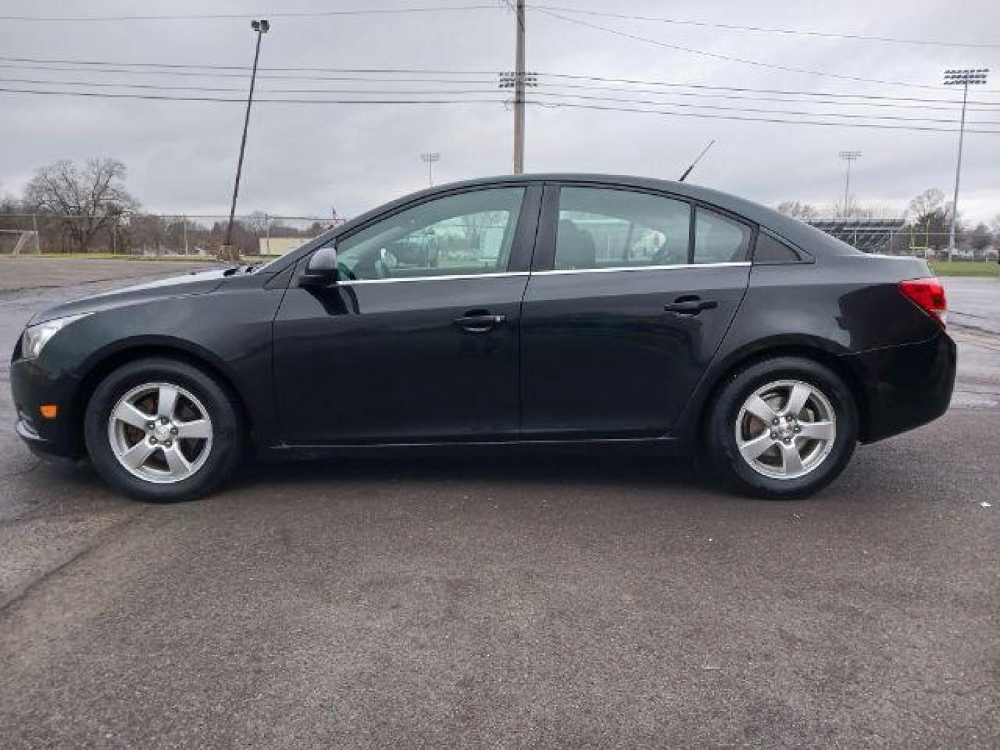 2014 Black Granite Metallic Chevrolet Cruze 1LT Auto (1G1PC5SB4E7) with an 1.4L L4 DOHC 16V TURBO engine, 6-Speed Automatic transmission, located at 4508 South Dixie Dr, Moraine, OH, 45439, (937) 908-9800, 39.689976, -84.218452 - Photo#3