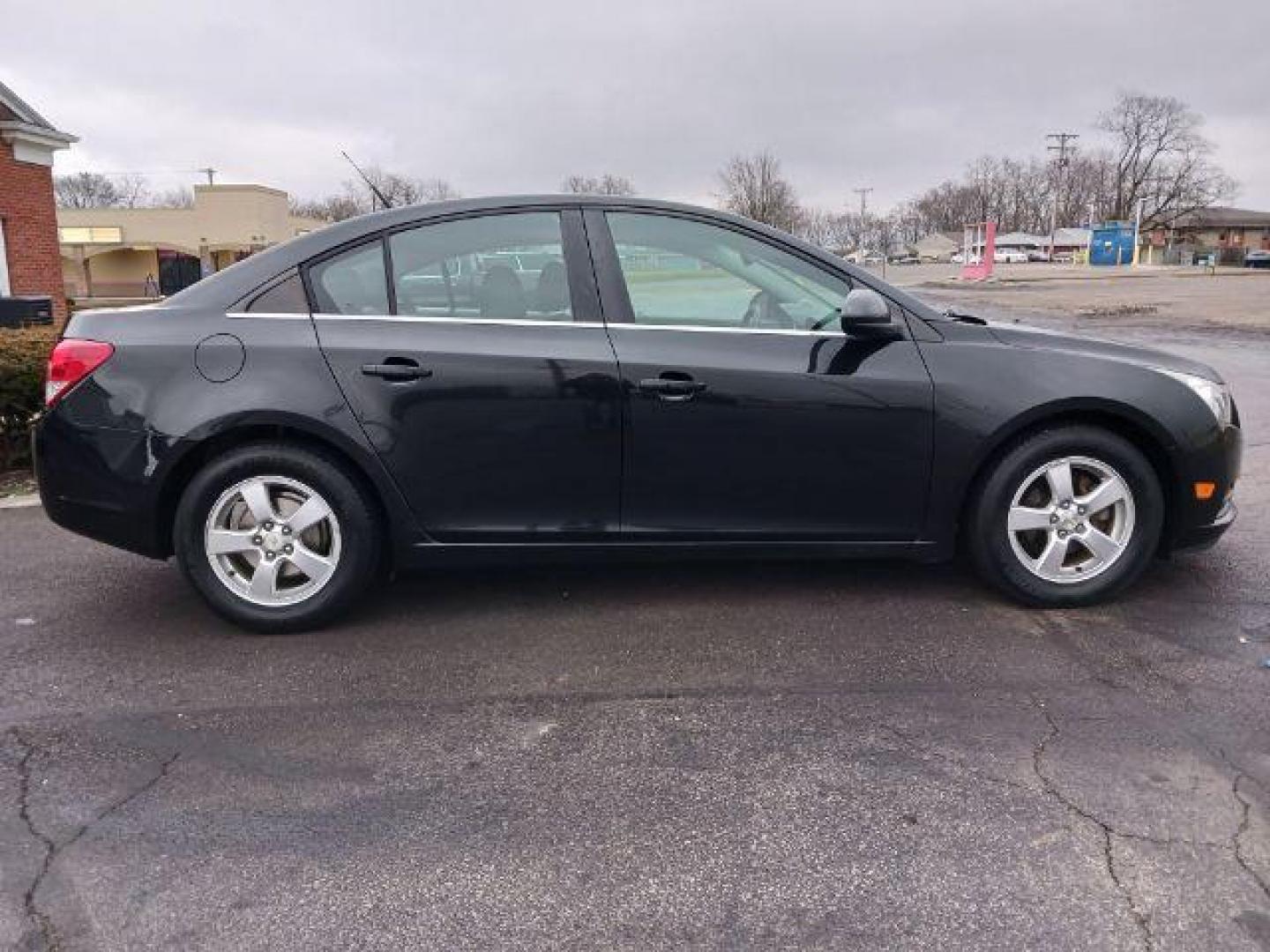 2014 Black Granite Metallic Chevrolet Cruze 1LT Auto (1G1PC5SB4E7) with an 1.4L L4 DOHC 16V TURBO engine, 6-Speed Automatic transmission, located at 4508 South Dixie Dr, Moraine, OH, 45439, (937) 908-9800, 39.689976, -84.218452 - Photo#4