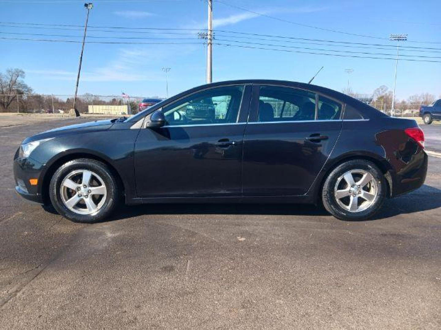 2014 Black Granite Metallic Chevrolet Cruze 1LT Auto (1G1PC5SB2E7) with an 1.4L L4 DOHC 16V TURBO engine, 6-Speed Automatic transmission, located at 4508 South Dixie Dr, Moraine, OH, 45439, (937) 908-9800, 39.689976, -84.218452 - Photo#3