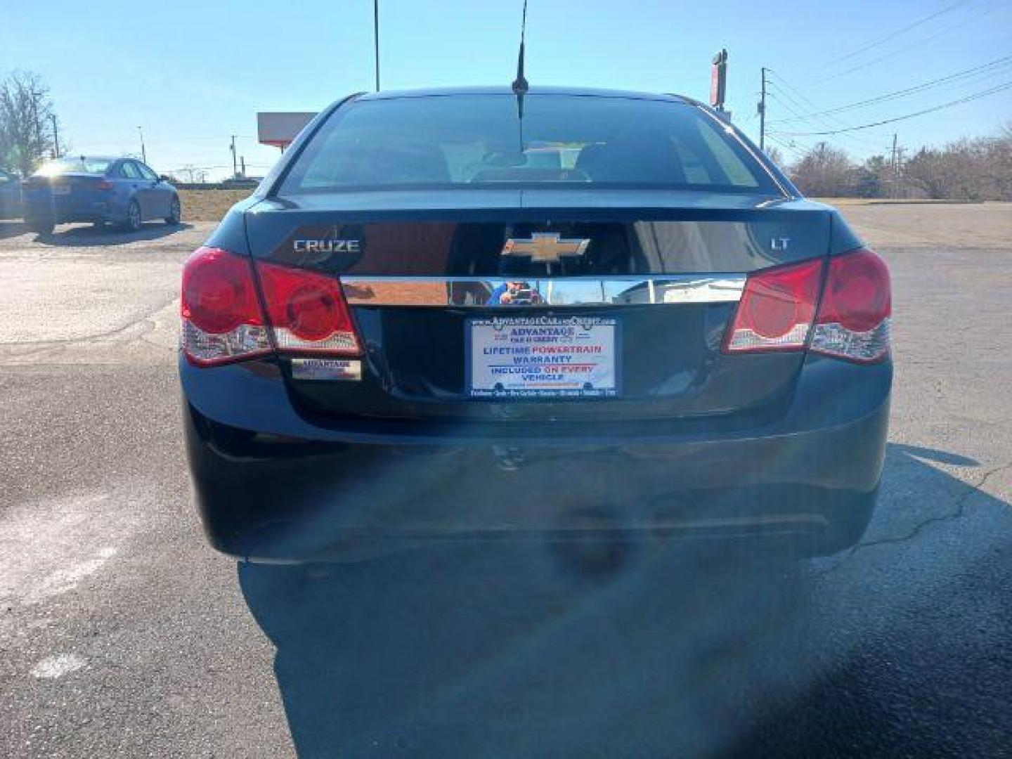 2014 Black Granite Metallic Chevrolet Cruze 1LT Auto (1G1PC5SB2E7) with an 1.4L L4 DOHC 16V TURBO engine, 6-Speed Automatic transmission, located at 4508 South Dixie Dr, Moraine, OH, 45439, (937) 908-9800, 39.689976, -84.218452 - Photo#5