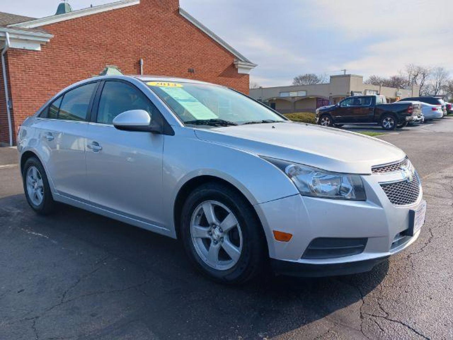 2014 Silver Ice Metallic Chevrolet Cruze 1LT Auto (1G1PC5SB0E7) with an 1.4L L4 DOHC 16V TURBO engine, 6-Speed Automatic transmission, located at 401 Woodman Dr, Riverside, OH, 45431, (937) 908-9800, 39.760899, -84.123421 - Photo#0