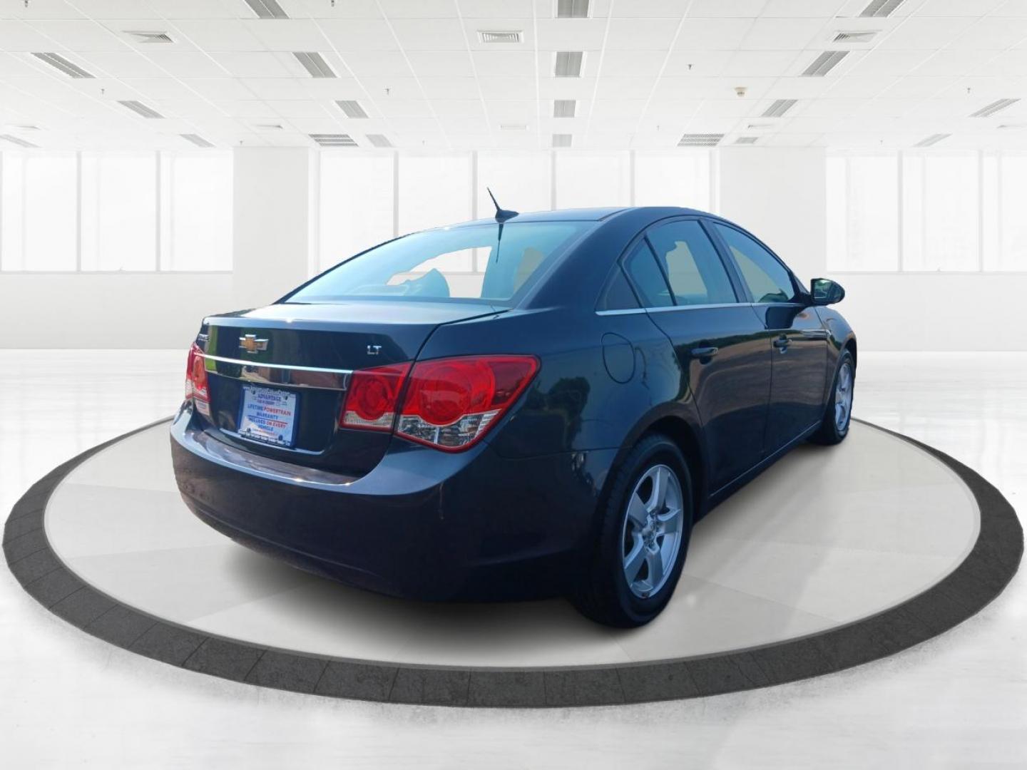 2014 Blue Ray Metallic Chevrolet Cruze 1LT Auto (1G1PC5SB6E7) with an 1.4L L4 DOHC 16V TURBO engine, 6-Speed Automatic transmission, located at 4508 South Dixie Dr, Moraine, OH, 45439, (937) 908-9800, 39.689976, -84.218452 - Photo#2