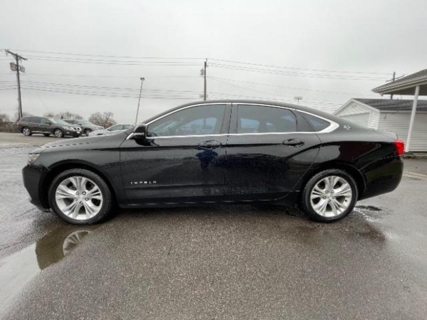 2014 Black Chevrolet Impala 2LT (2G1125S32E9) with an 3.6L V6 DOHC 24VV FFV engine, 6-Speed Automatic transmission, located at 1184 Kauffman Ave, Fairborn, OH, 45324, (937) 908-9800, 39.807072, -84.030914 - Photo#2