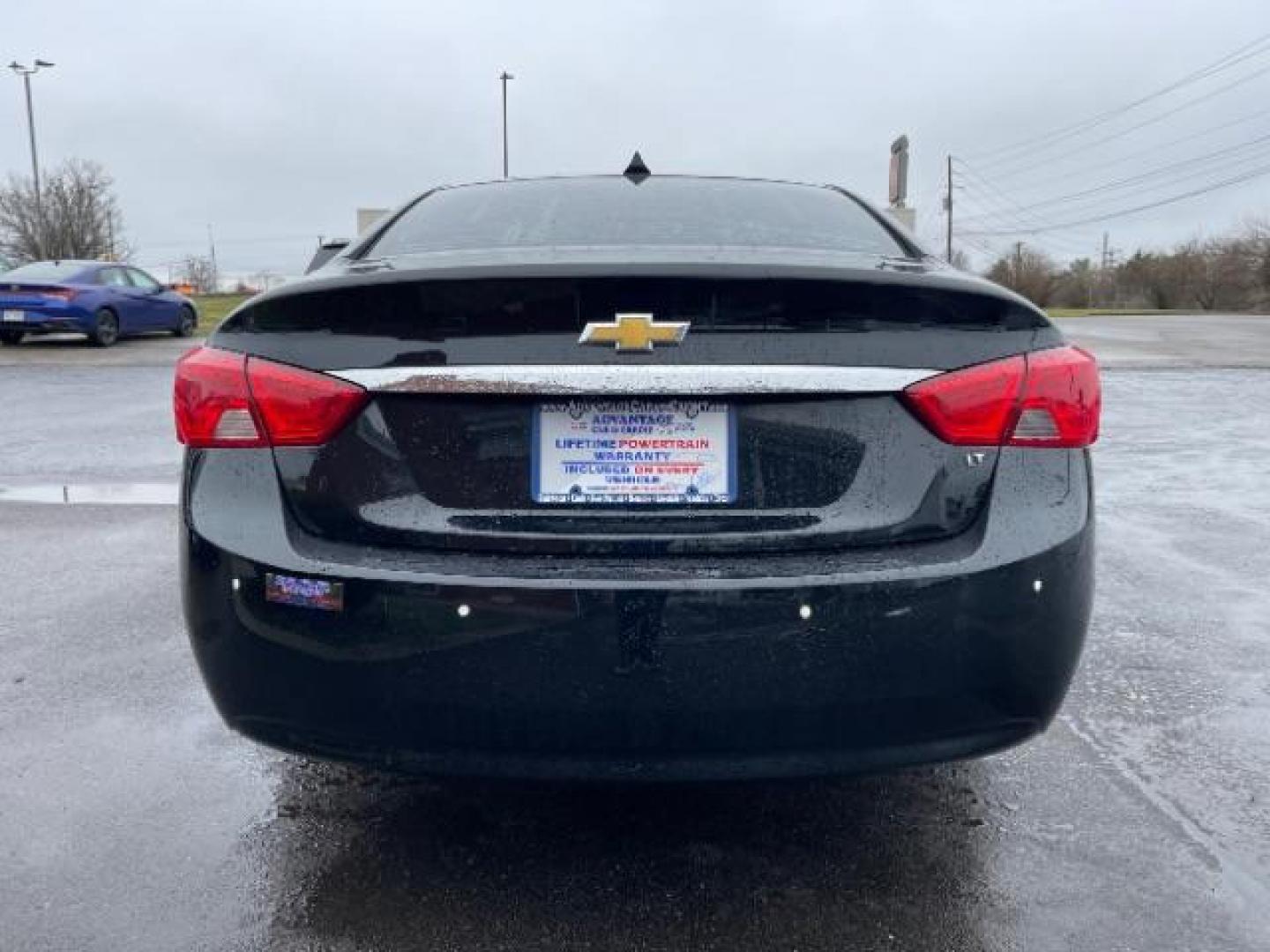 2014 Black Chevrolet Impala 2LT (2G1125S32E9) with an 3.6L V6 DOHC 24VV FFV engine, 6-Speed Automatic transmission, located at 1184 Kauffman Ave, Fairborn, OH, 45324, (937) 908-9800, 39.807072, -84.030914 - Photo#5