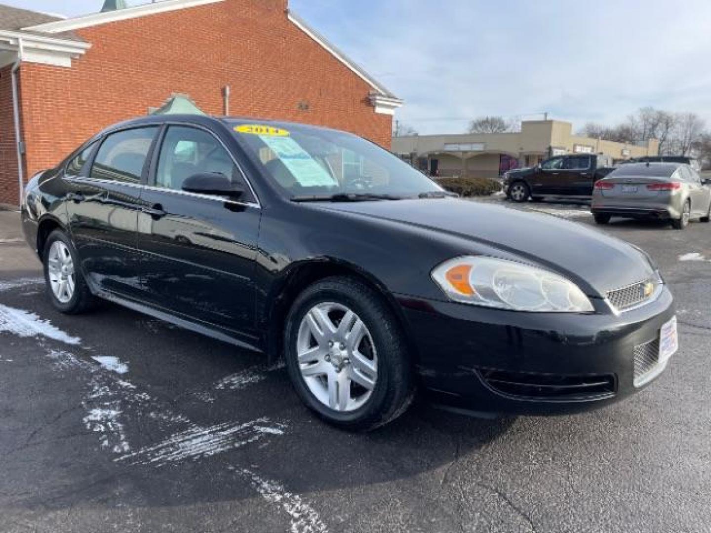 2014 Black Chevrolet Impala Limited LT (2G1WB5E37E1) with an 3.6L V6 DOHC 16V FFV engine, 6-Speed Automatic transmission, located at 1099 N County Rd 25A , Troy, OH, 45373, (937) 908-9800, 40.057079, -84.212883 - Photo#0