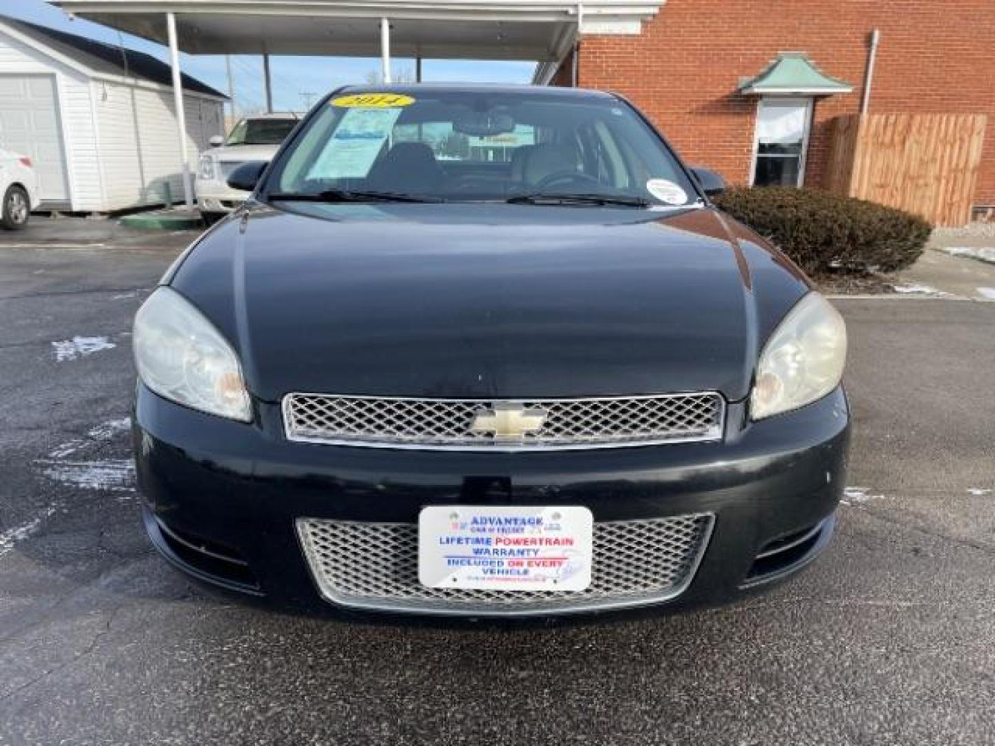 2014 Black Chevrolet Impala Limited LT (2G1WB5E37E1) with an 3.6L V6 DOHC 16V FFV engine, 6-Speed Automatic transmission, located at 1099 N County Rd 25A , Troy, OH, 45373, (937) 908-9800, 40.057079, -84.212883 - Photo#5