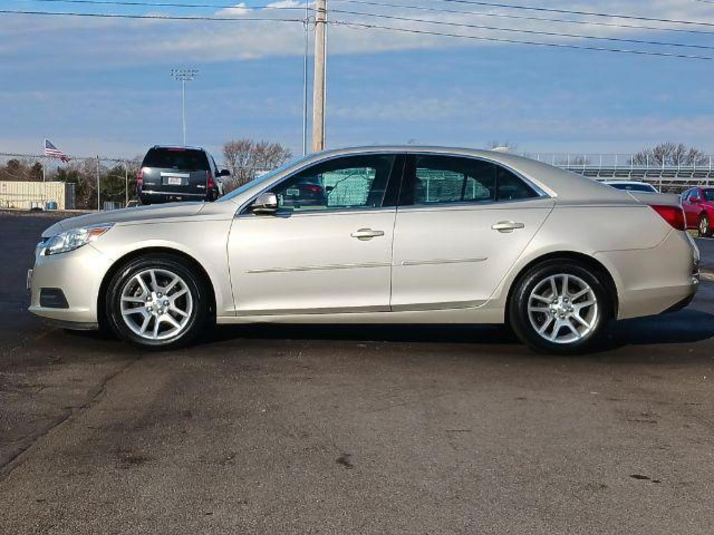 2014 Champagne Silver Metallic Chevrolet Malibu 1LT (1G11C5SL6EF) with an 2.5L L4 DOHC 16V engine, 6-Speed Automatic transmission, located at 4508 South Dixie Dr, Moraine, OH, 45439, (937) 908-9800, 39.689976, -84.218452 - Photo#3