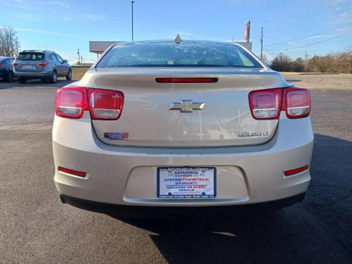 2014 Champagne Silver Metallic Chevrolet Malibu 1LT (1G11C5SL6EF) with an 2.5L L4 DOHC 16V engine, 6-Speed Automatic transmission, located at 4508 South Dixie Dr, Moraine, OH, 45439, (937) 908-9800, 39.689976, -84.218452 - Photo#5