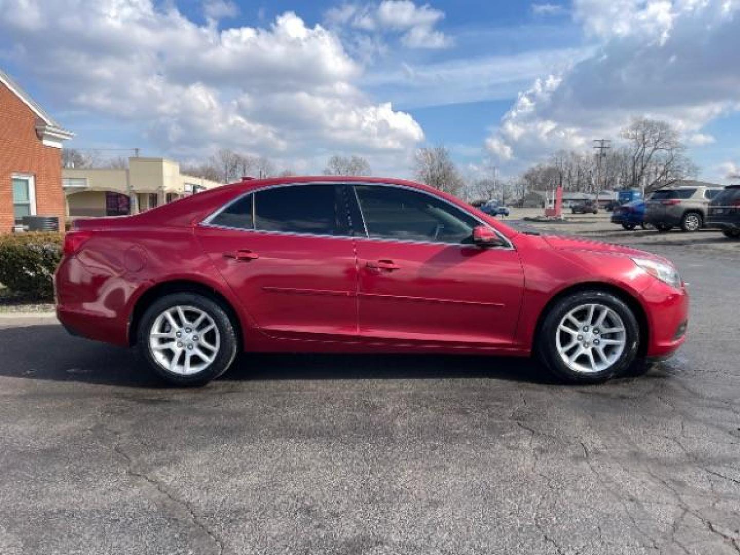 2014 Butte Red Metallic Chevrolet Malibu 1LT (1G11C5SL7EF) with an 2.5L L4 DOHC 16V engine, 6-Speed Automatic transmission, located at 401 Woodman Dr, Riverside, OH, 45431, (937) 908-9800, 39.760899, -84.123421 - Photo#3