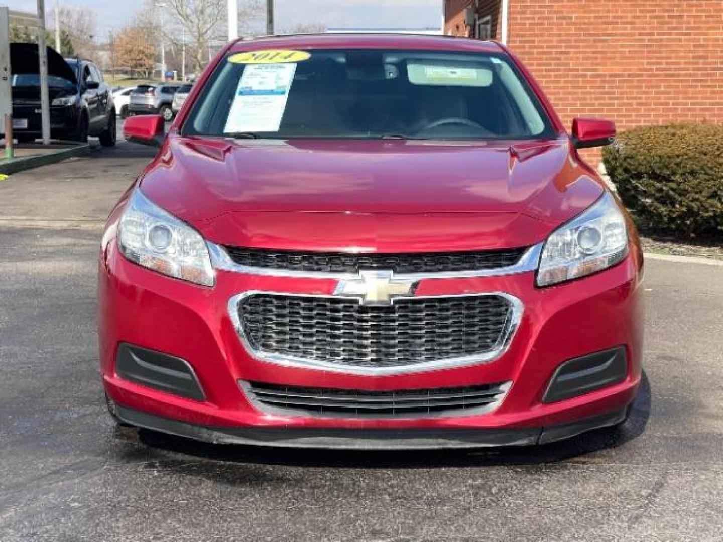 2014 Butte Red Metallic Chevrolet Malibu 1LT (1G11C5SL7EF) with an 2.5L L4 DOHC 16V engine, 6-Speed Automatic transmission, located at 401 Woodman Dr, Riverside, OH, 45431, (937) 908-9800, 39.760899, -84.123421 - Photo#4