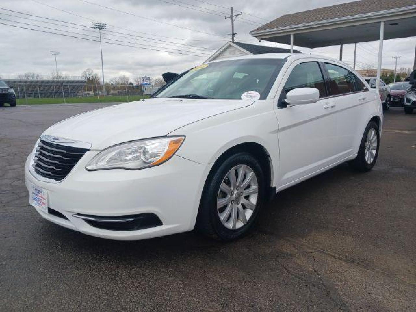 2014 Bright White Clearcoat Chrysler 200 Touring (1C3CCBBG1EN) with an 3.6L V6 DOHC 24V FFV engine, 6-Speed Automatic transmission, located at 1951 S Dayton Lakeview Rd., New Carlisle, OH, 45344, (937) 908-9800, 39.890999, -84.050255 - Photo#1