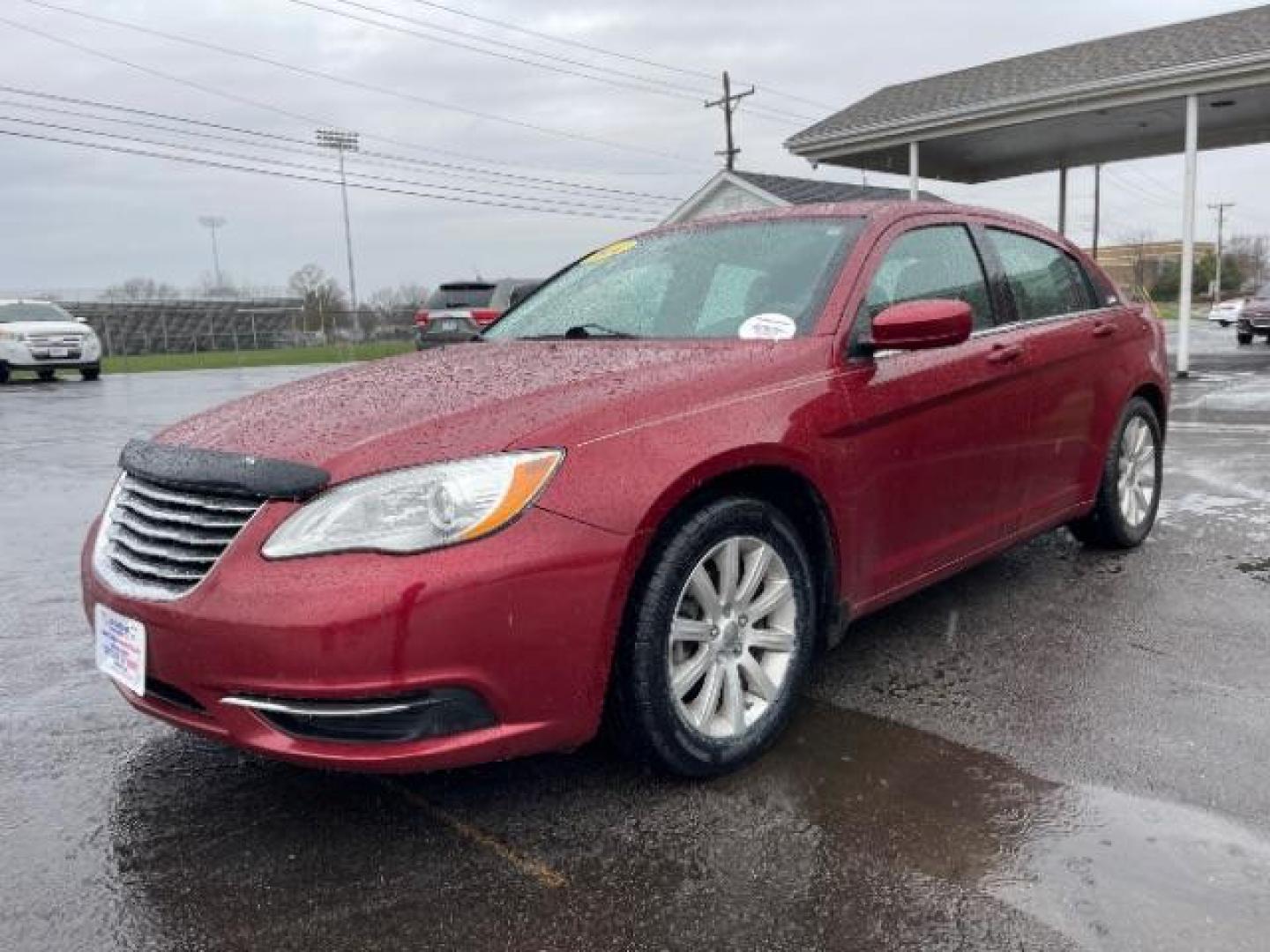 2014 Dp Cherry Red Crystal PC Chrysler 200 Touring (1C3CCBBG0EN) with an 3.6L V6 DOHC 24V FFV engine, 6-Speed Automatic transmission, located at 401 Woodman Dr, Riverside, OH, 45431, (937) 908-9800, 39.760899, -84.123421 - Photo#1