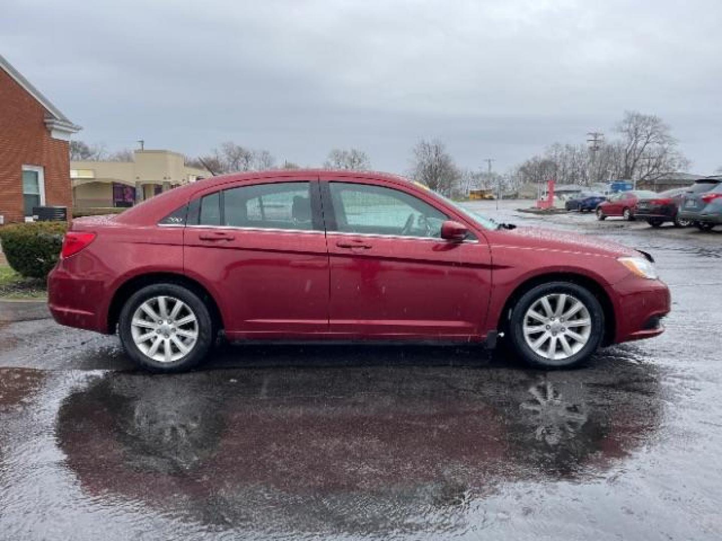 2014 Dp Cherry Red Crystal PC Chrysler 200 Touring (1C3CCBBG0EN) with an 3.6L V6 DOHC 24V FFV engine, 6-Speed Automatic transmission, located at 401 Woodman Dr, Riverside, OH, 45431, (937) 908-9800, 39.760899, -84.123421 - Photo#4