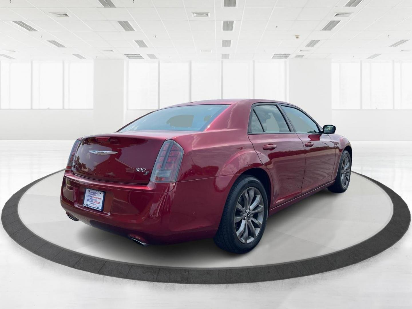 2014 Dp Cherry Red Crystal PC Chrysler 300 (2C3CCAGG9EH) with an 3.6L V6 DOHC 24V engine, 8-Speed Automatic transmission, located at 880 E. National Road, Vandalia, OH, 45377, (937) 908-9800, 39.891918, -84.183594 - Photo#2