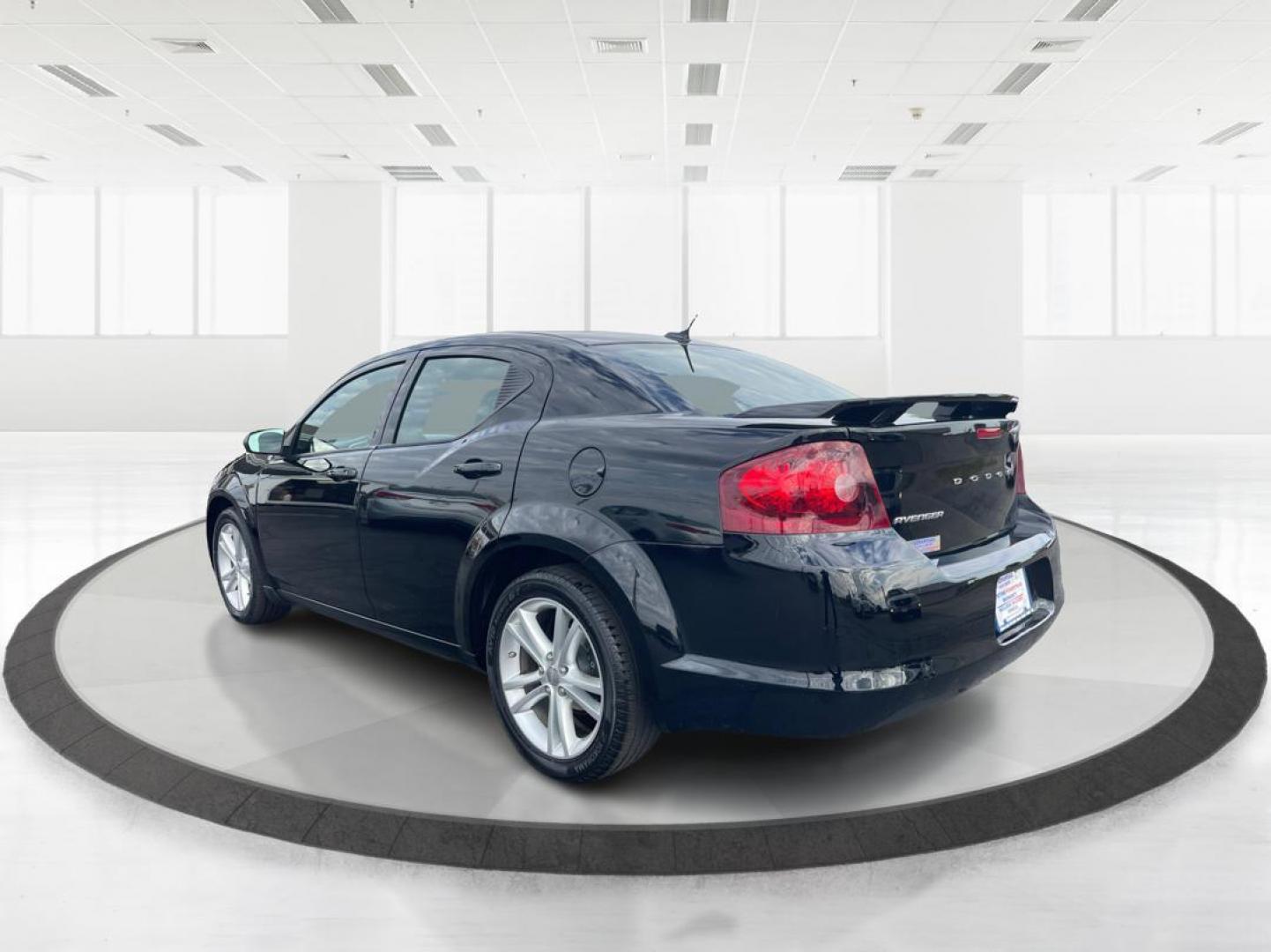 2014 Black Clearcoat Dodge Avenger SE (1C3CDZAB9EN) with an 2.4L L4 DOHC 16V engine, 4-Speed Automatic transmission, located at 1099 N County Rd 25A , Troy, OH, 45373, (937) 908-9800, 40.057079, -84.212883 - Photo#4