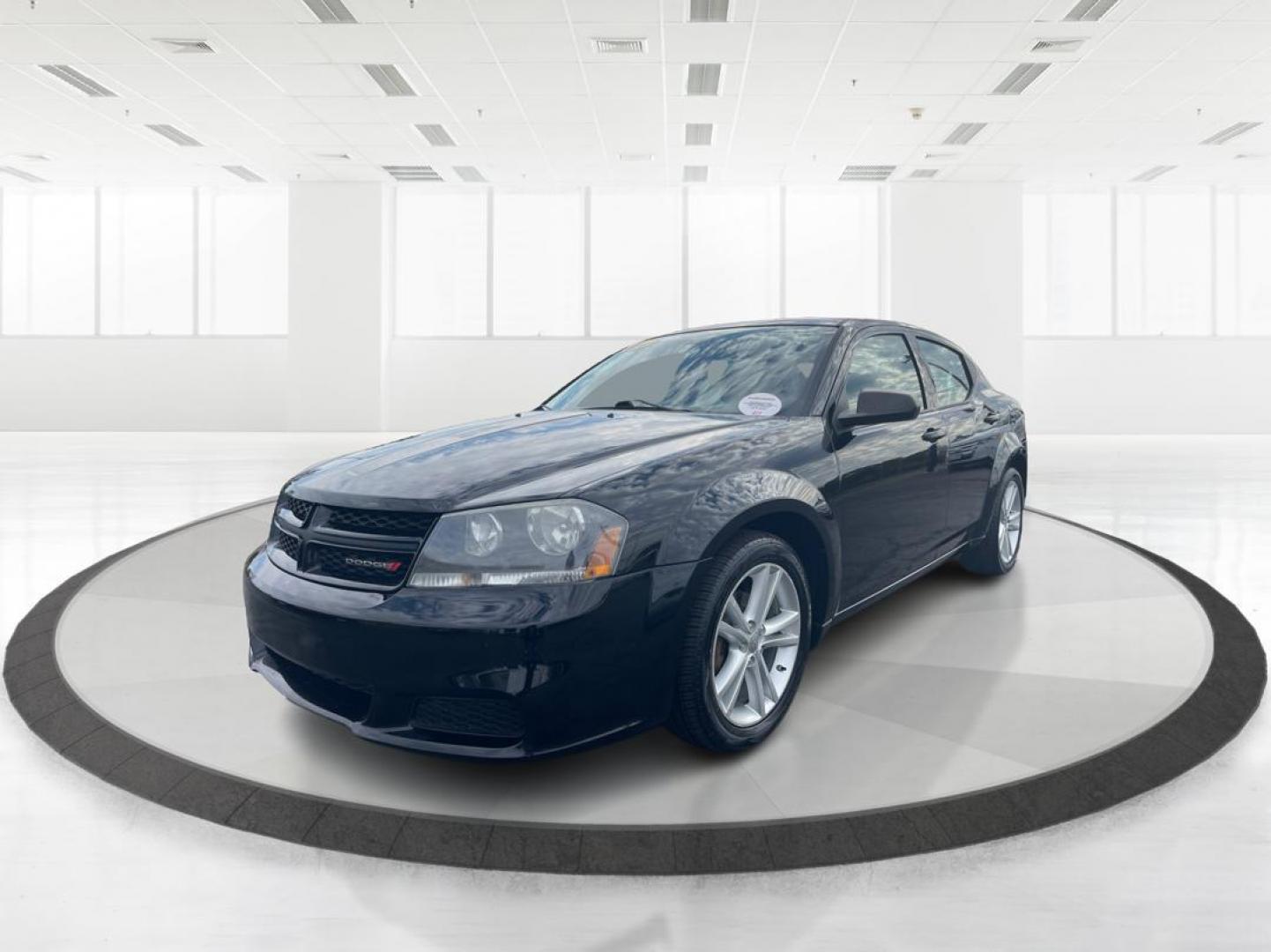 2014 Black Clearcoat Dodge Avenger SE (1C3CDZAB9EN) with an 2.4L L4 DOHC 16V engine, 4-Speed Automatic transmission, located at 1099 N County Rd 25A , Troy, OH, 45373, (937) 908-9800, 40.057079, -84.212883 - Photo#7