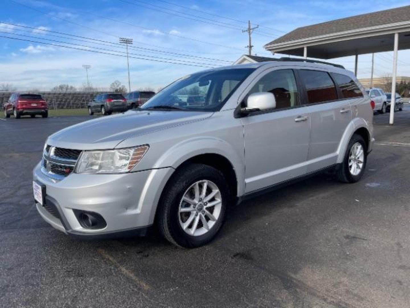 2014 Bright Silver Metallic CC Dodge Journey SXT (3C4PDCBG0ET) with an 3.6L V6 DOHC 24V engine, 6-Speed Automatic transmission, located at 401 Woodman Dr, Riverside, OH, 45431, (937) 908-9800, 39.760899, -84.123421 - Photo#1