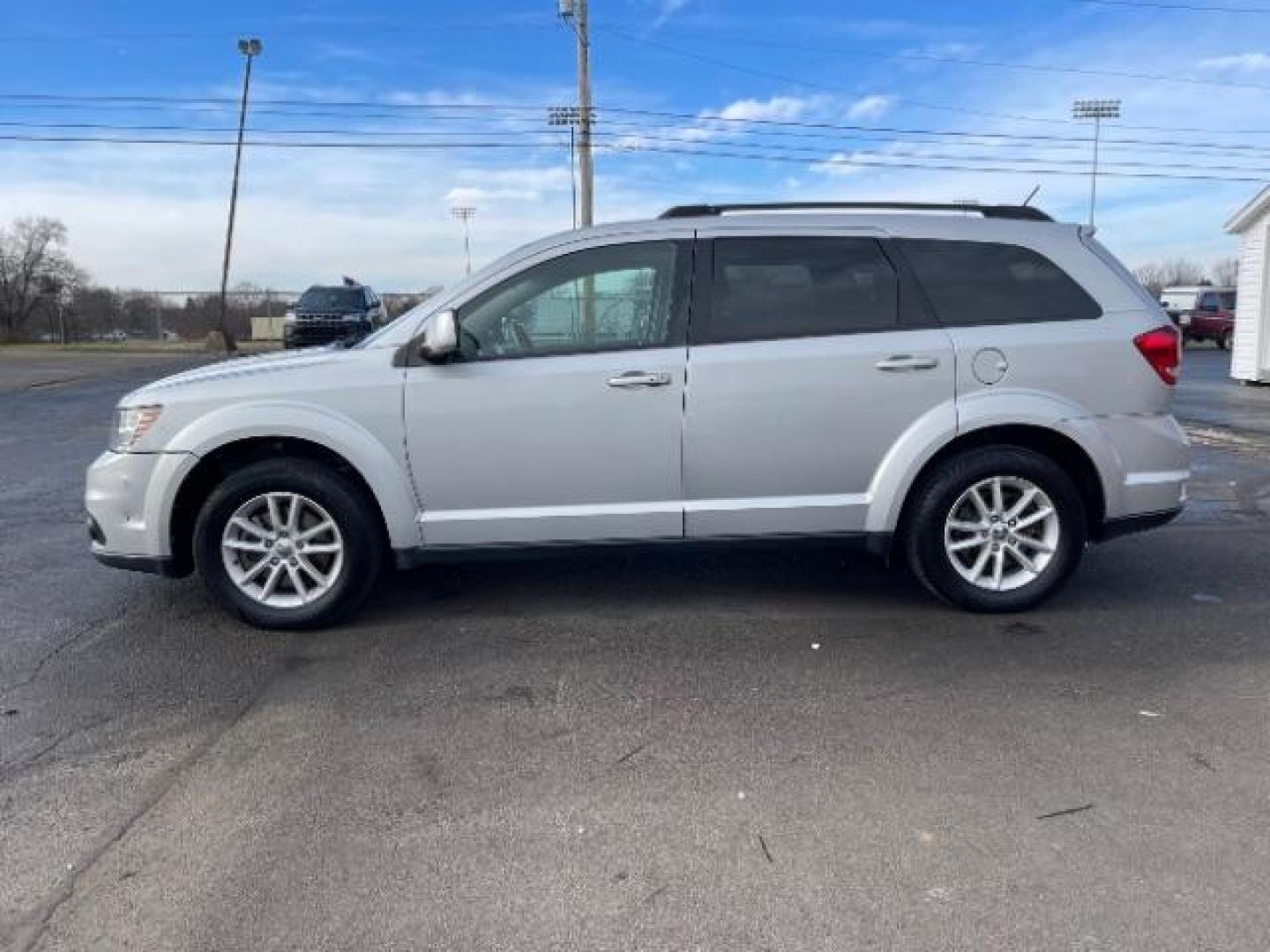 2014 Bright Silver Metallic CC Dodge Journey SXT (3C4PDCBG0ET) with an 3.6L V6 DOHC 24V engine, 6-Speed Automatic transmission, located at 401 Woodman Dr, Riverside, OH, 45431, (937) 908-9800, 39.760899, -84.123421 - Photo#2