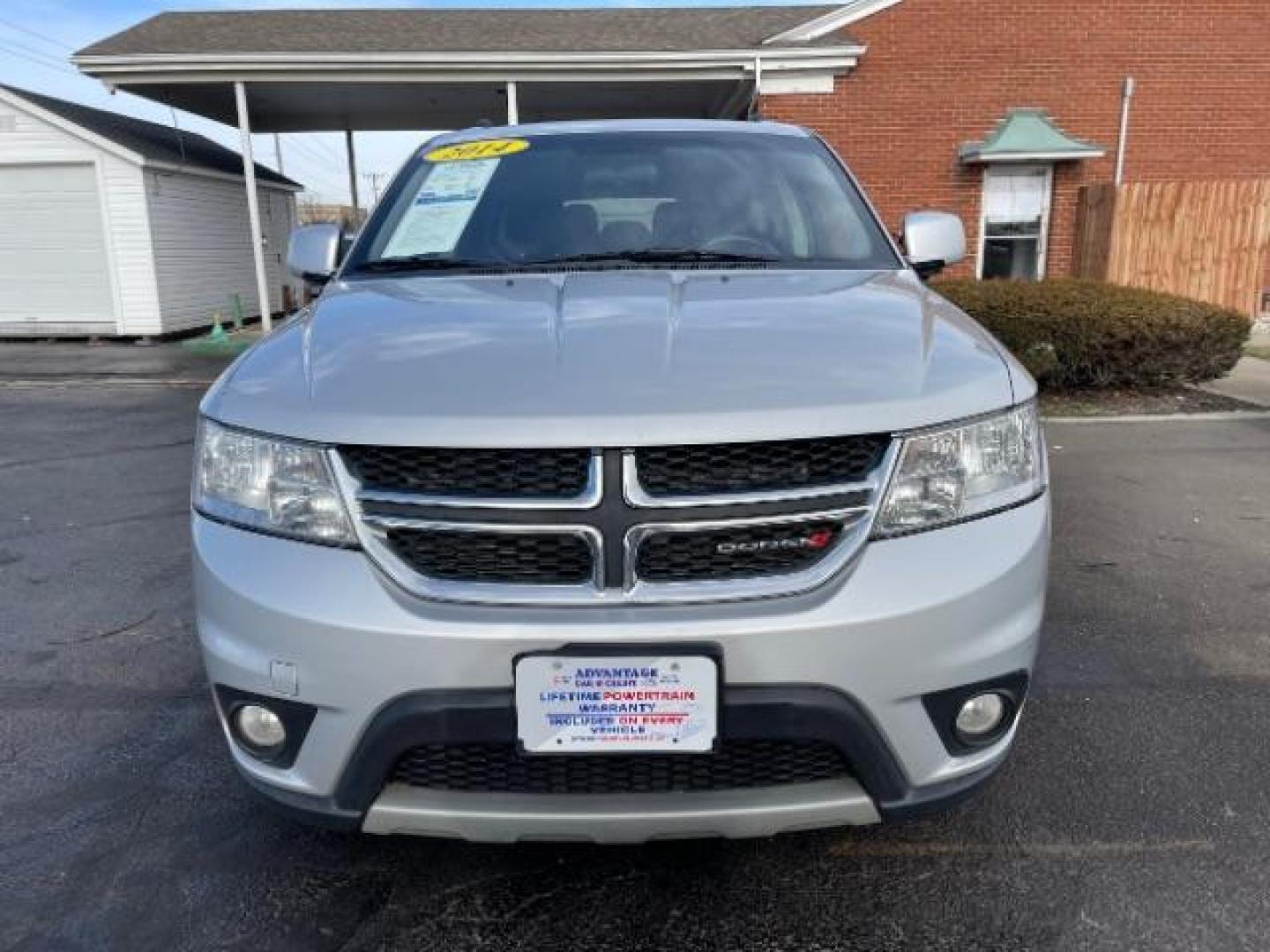 2014 Bright Silver Metallic CC Dodge Journey SXT (3C4PDCBG0ET) with an 3.6L V6 DOHC 24V engine, 6-Speed Automatic transmission, located at 401 Woodman Dr, Riverside, OH, 45431, (937) 908-9800, 39.760899, -84.123421 - Photo#5