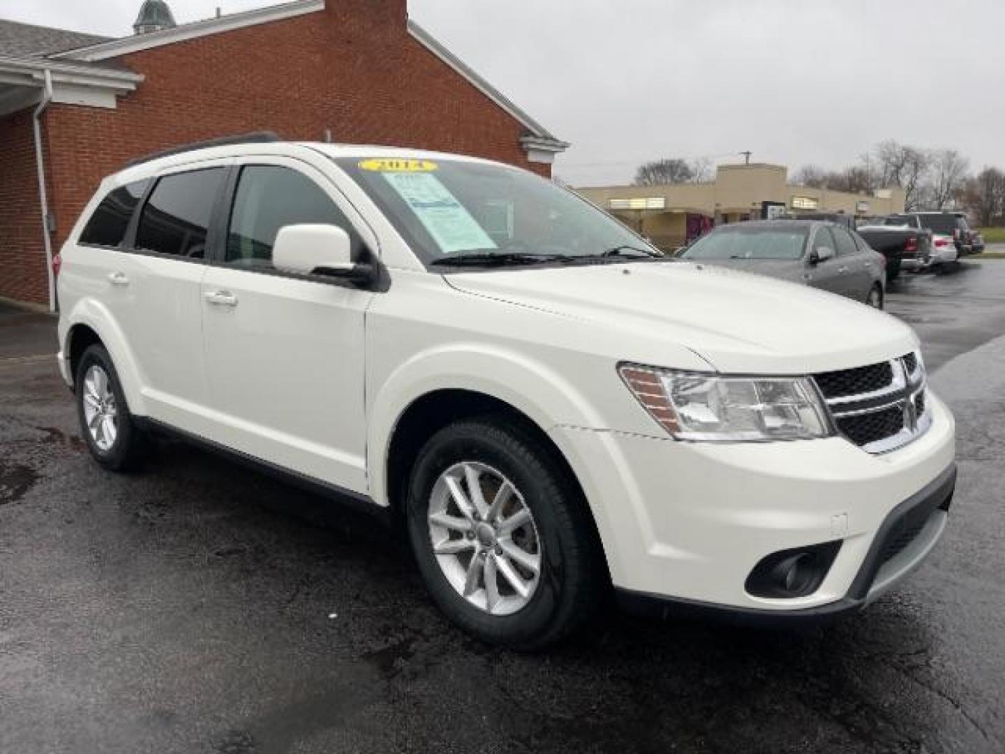 2014 Pearl White Tri-Coat Dodge Journey SXT (3C4PDCBG0ET) with an 3.6L V6 DOHC 24V engine, 6-Speed Automatic transmission, located at 4508 South Dixie Dr, Moraine, OH, 45439, (937) 908-9800, 39.689976, -84.218452 - Photo#0