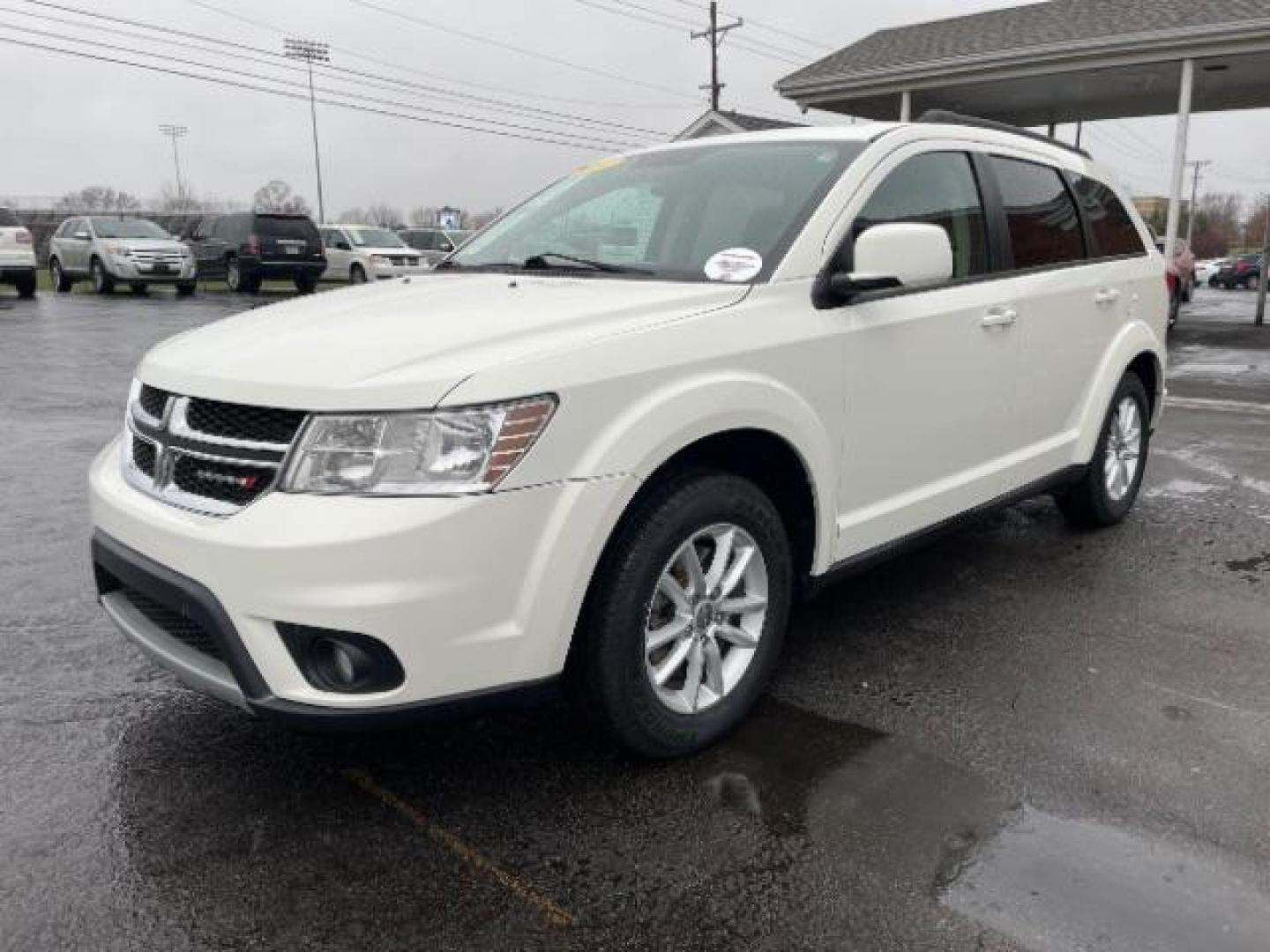 2014 Pearl White Tri-Coat Dodge Journey SXT (3C4PDCBG0ET) with an 3.6L V6 DOHC 24V engine, 6-Speed Automatic transmission, located at 4508 South Dixie Dr, Moraine, OH, 45439, (937) 908-9800, 39.689976, -84.218452 - Photo#1