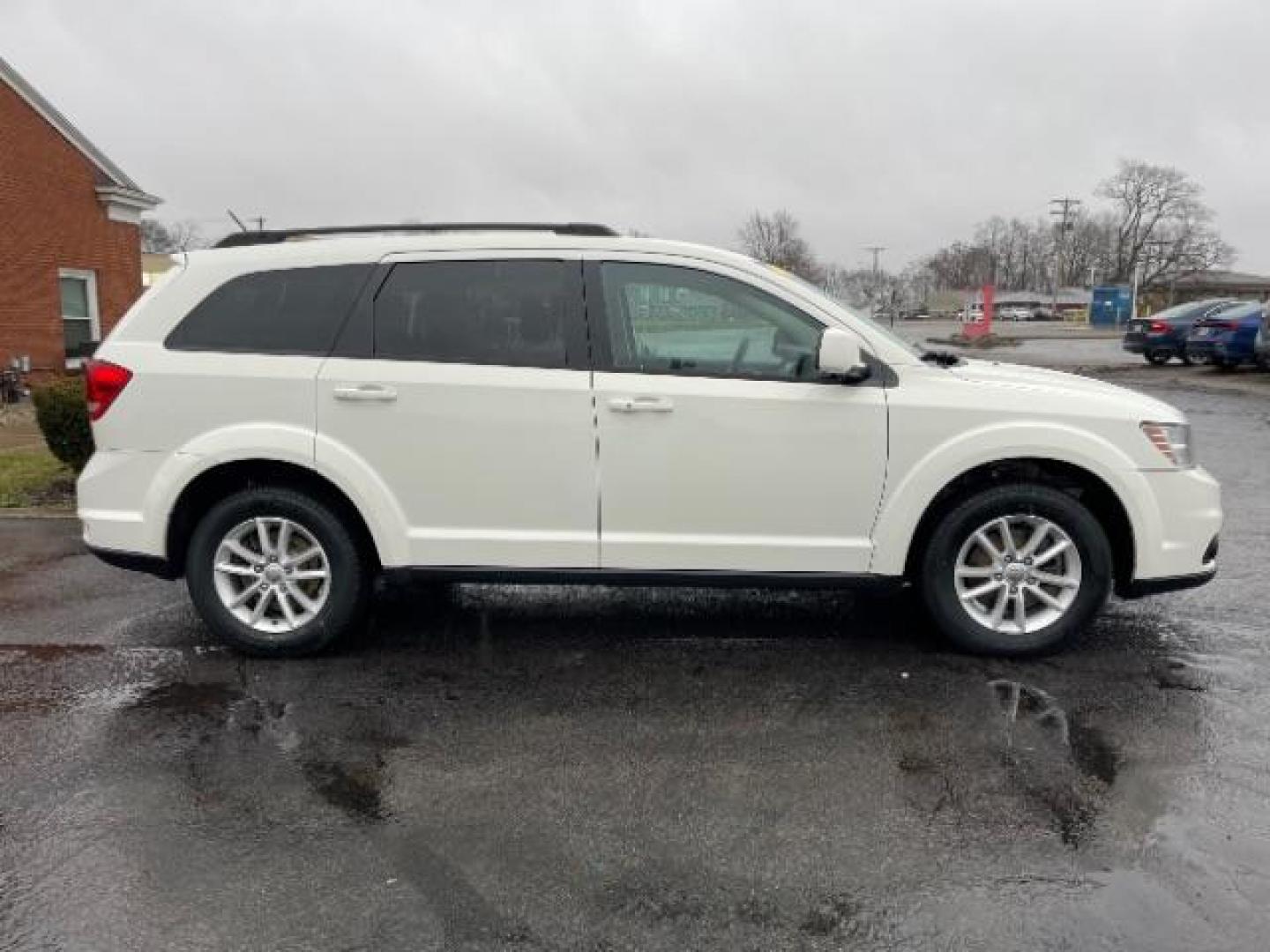 2014 Pearl White Tri-Coat Dodge Journey SXT (3C4PDCBG0ET) with an 3.6L V6 DOHC 24V engine, 6-Speed Automatic transmission, located at 4508 South Dixie Dr, Moraine, OH, 45439, (937) 908-9800, 39.689976, -84.218452 - Photo#3