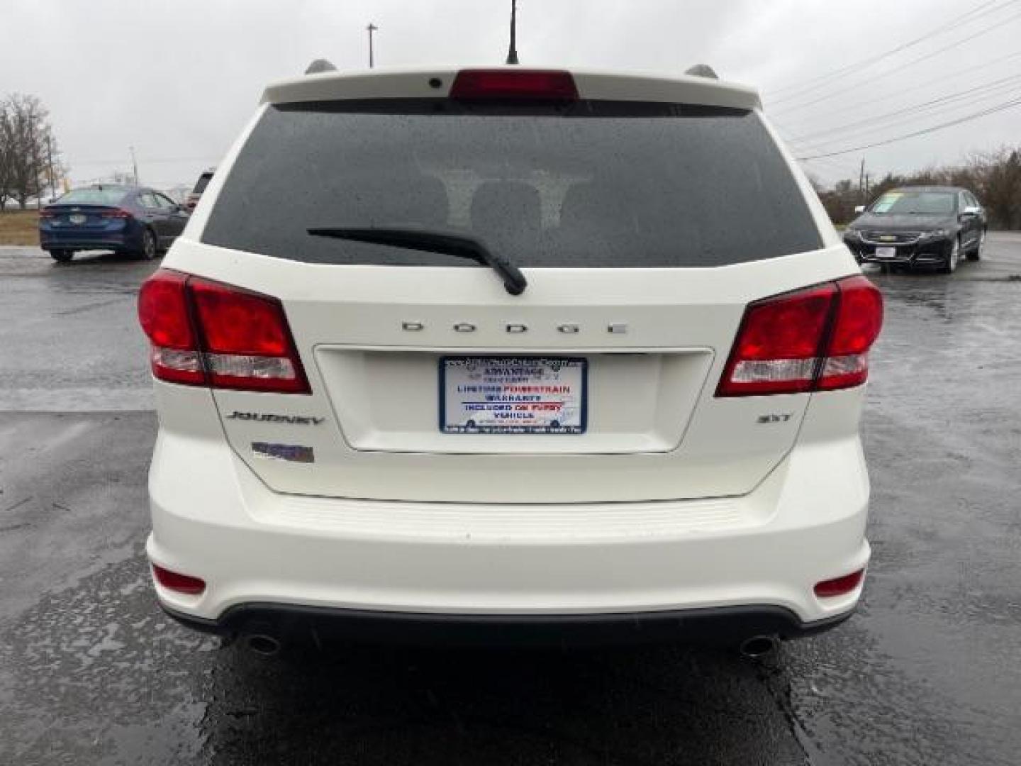 2014 Pearl White Tri-Coat Dodge Journey SXT (3C4PDCBG0ET) with an 3.6L V6 DOHC 24V engine, 6-Speed Automatic transmission, located at 4508 South Dixie Dr, Moraine, OH, 45439, (937) 908-9800, 39.689976, -84.218452 - Photo#5