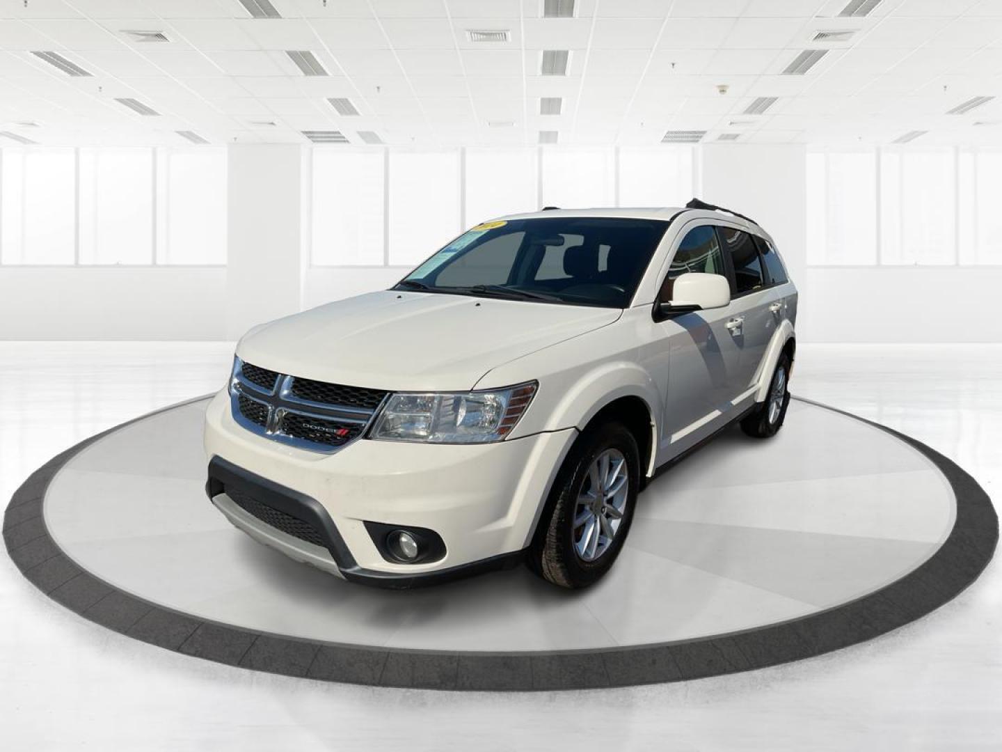 2014 Pearl White Tri-Coat Dodge Journey SXT (3C4PDCBG0ET) with an 3.6L V6 DOHC 24V engine, 6-Speed Automatic transmission, located at 8750 N County Rd 25A, Piqua, OH, 45356, (937) 908-9800, 40.164391, -84.232513 - Photo#7