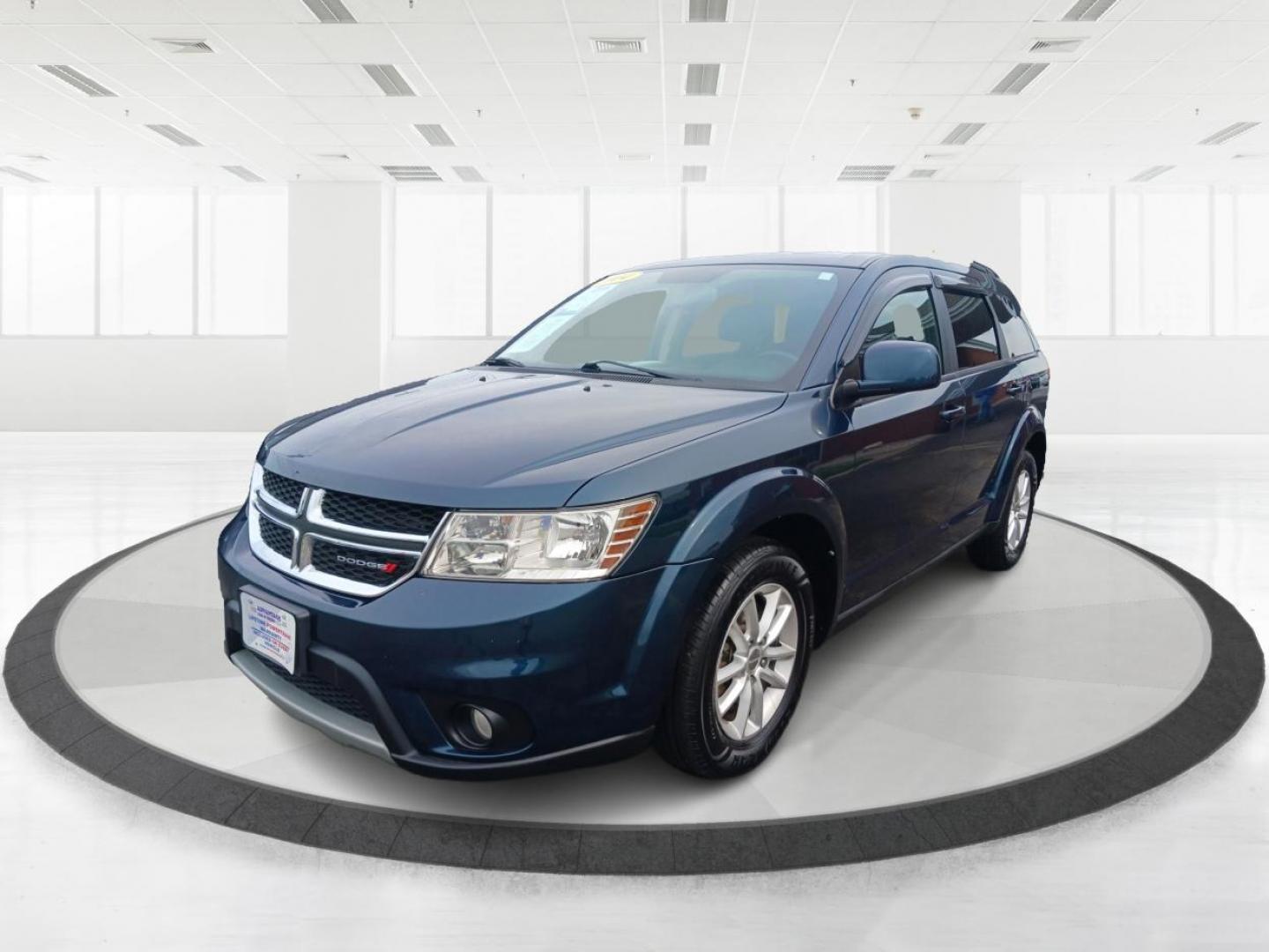 2014 Fathom Blue Pearlcoat Dodge Journey (3C4PDCBB1ET) with an 2.4L L6 DOHC 16V engine, 4-Speed Automatic transmission, located at 401 Woodman Dr, Riverside, OH, 45431, (937) 908-9800, 39.760899, -84.123421 - Photo#7