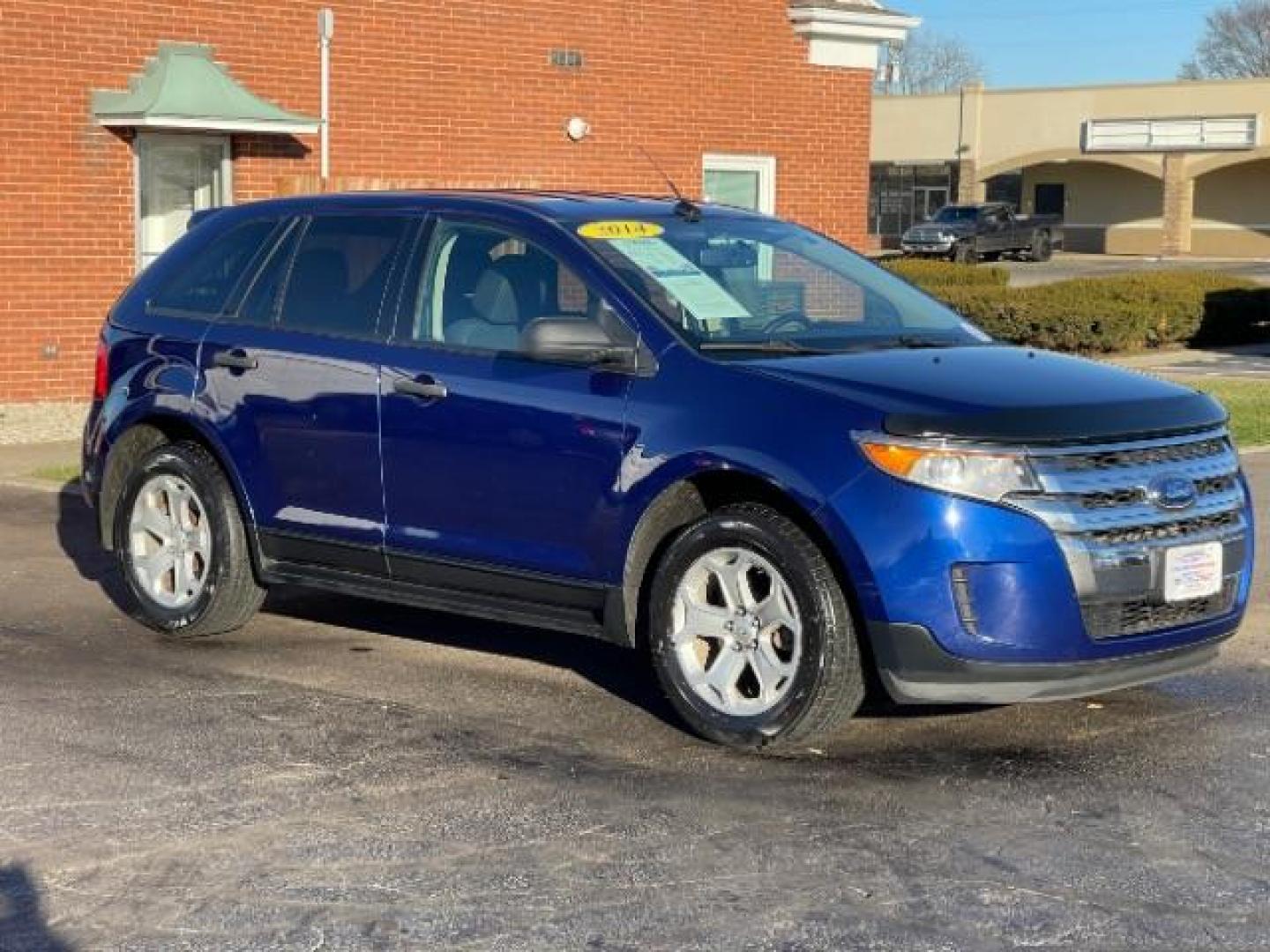 2014 Deep Impact Blue Metallic Ford Edge SE FWD (2FMDK3G93EB) with an 2.0L L4 DOHC 16V engine, 6-Speed Automatic transmission, located at 880 E. National Road, Vandalia, OH, 45377, (937) 908-9800, 39.891918, -84.183594 - Photo#0