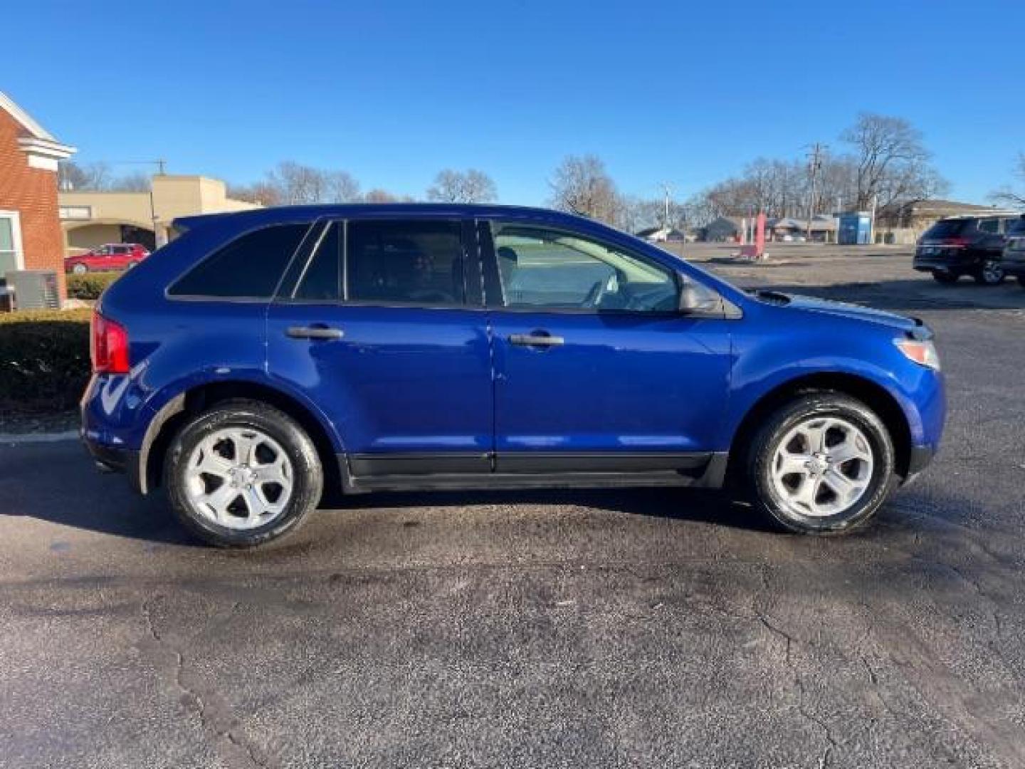 2014 Deep Impact Blue Metallic Ford Edge SE FWD (2FMDK3G93EB) with an 2.0L L4 DOHC 16V engine, 6-Speed Automatic transmission, located at 880 E. National Road, Vandalia, OH, 45377, (937) 908-9800, 39.891918, -84.183594 - Photo#3